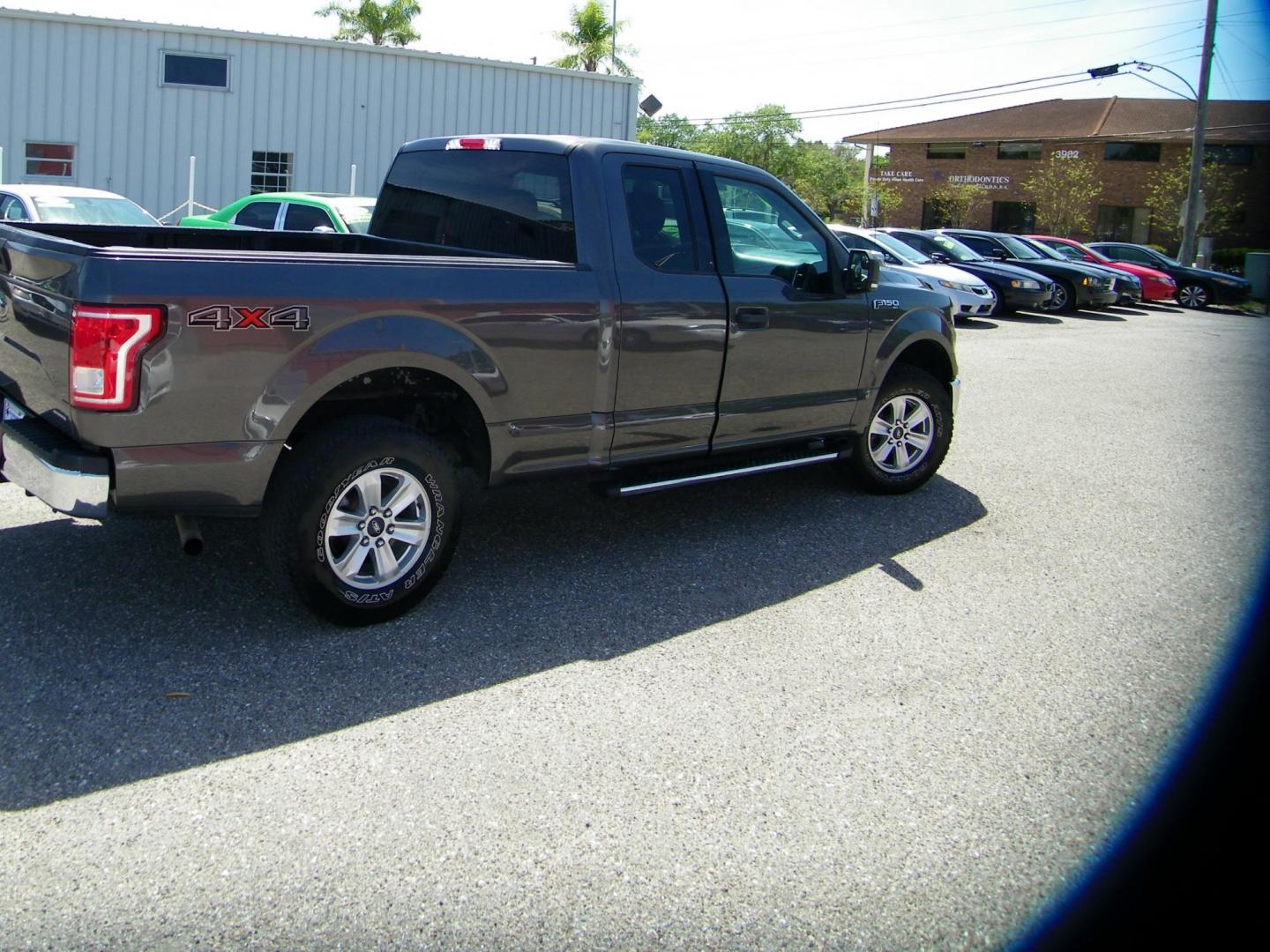2015 Gray /Gray Ford F-150 Lariat SuperCab 6.5-ft. Bed 4WD (1FTEX1E89FK) with an 3.5L V6 DOHC 24V engine, 6-Speed Automatic transmission, located at 4000 Bee Ridge Road, Sarasota, FL, 34233, (941) 926-0300, 27.298664, -82.489151 - Photo#3