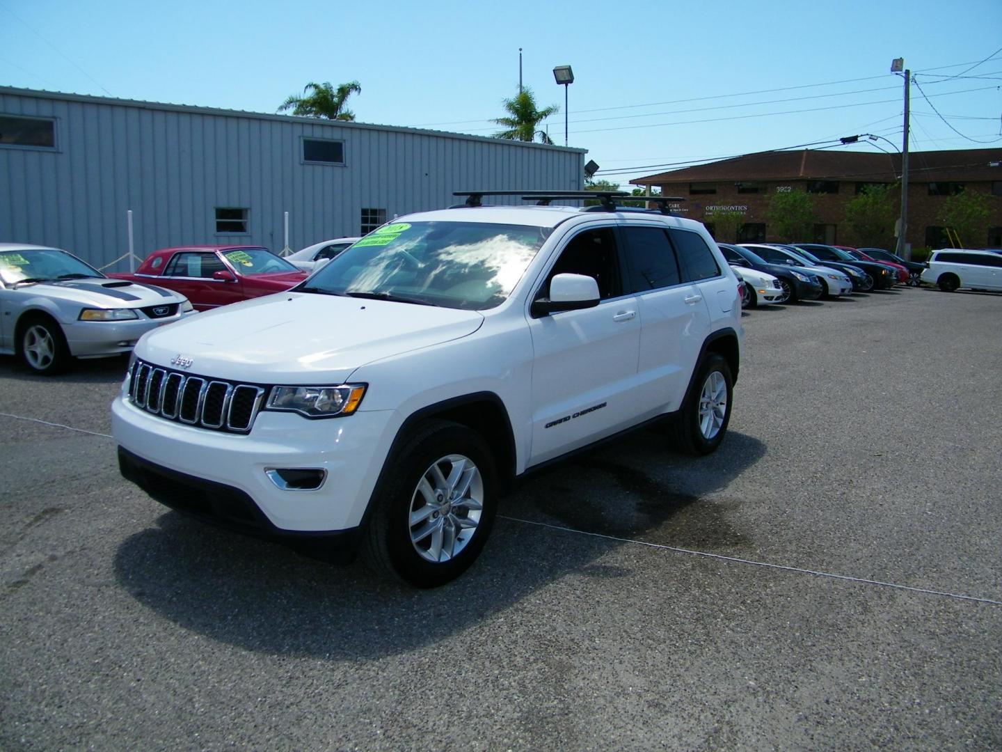 2018 White /Black Jeep Grand Cherokee Laredo 2WD (1C4RJEAG5JC) with an 3.6L V6 DOHC 24V engine, 8A transmission, located at 4000 Bee Ridge Road, Sarasota, FL, 34233, (941) 926-0300, 27.298664, -82.489151 - Photo#0