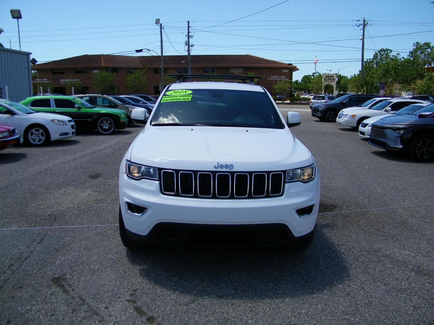 2018 White /Black Jeep Grand Cherokee Laredo 2WD (1C4RJEAG5JC) with an 3.6L V6 DOHC 24V engine, 8A transmission, located at 4000 Bee Ridge Road, Sarasota, FL, 34233, (941) 926-0300, 27.298664, -82.489151 - Photo#1