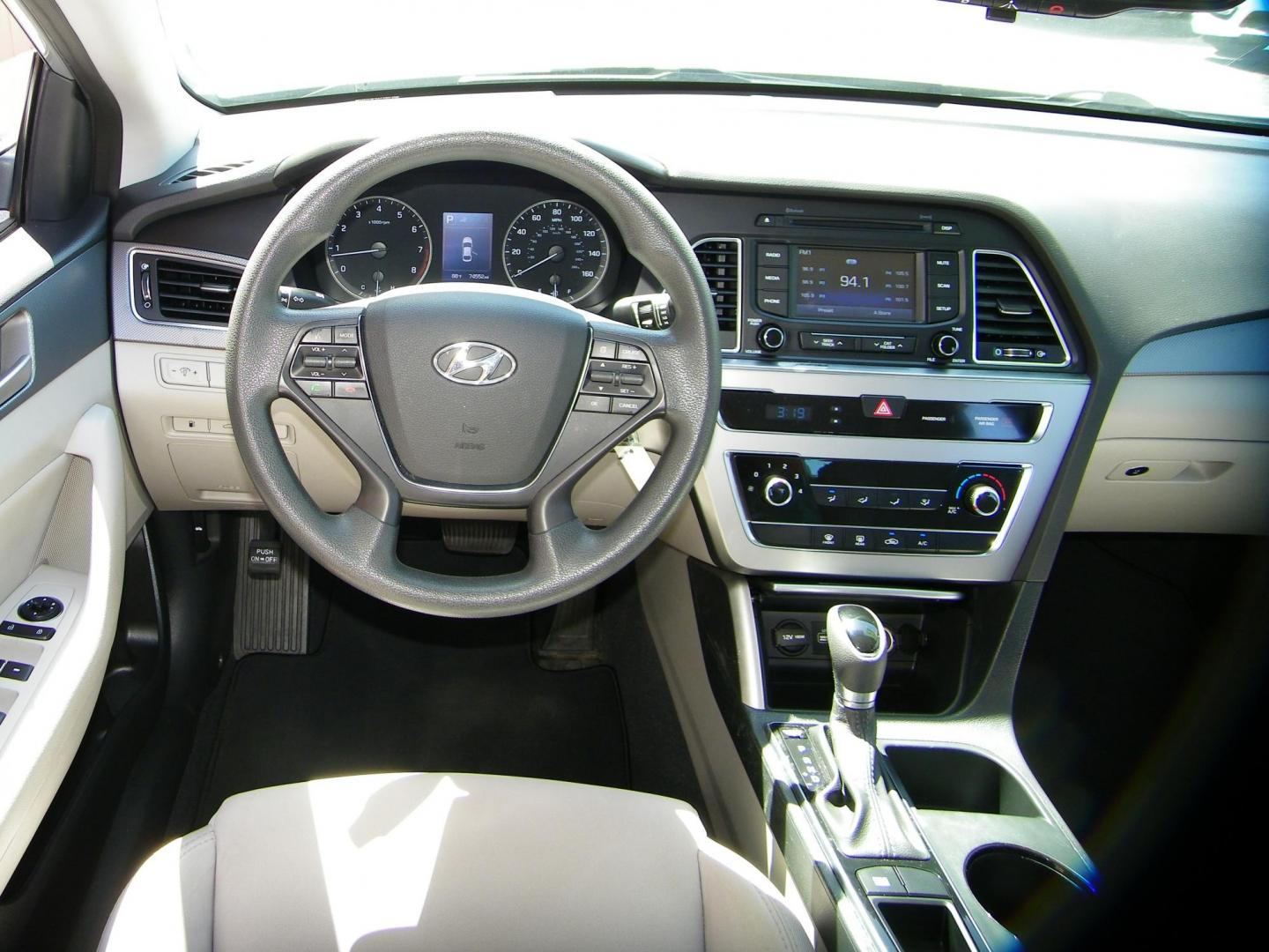 2015 Silver /Beige Hyundai Sonata ECO (5NPE24AF9FH) with an 1.6L L4 DOHC 16V engine, 7-Speed Automatic transmission, located at 4000 Bee Ridge Road, Sarasota, FL, 34233, (941) 926-0300, 27.298664, -82.489151 - Photo#13