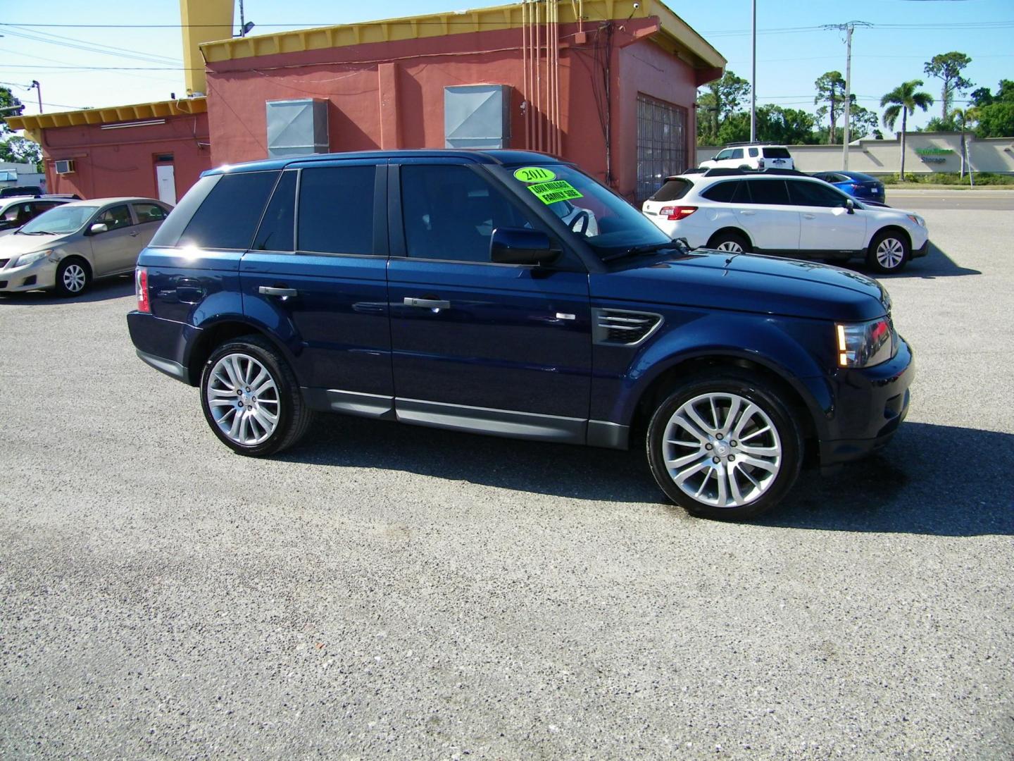 2011 Blue /Beige Land Rover Range Rover Sport HSE (SALSK2D43BA) with an 4.4L V8 DOHC 32V engine, 6-Speed Automatic transmission, located at 4000 Bee Ridge Road, Sarasota, FL, 34233, (941) 926-0300, 27.298664, -82.489151 - Photo#7