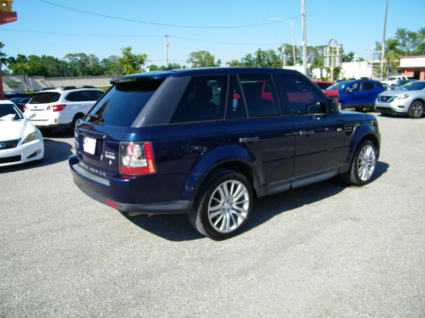 2011 Blue /Beige Land Rover Range Rover Sport HSE (SALSK2D43BA) with an 4.4L V8 DOHC 32V engine, 6-Speed Automatic transmission, located at 4000 Bee Ridge Road, Sarasota, FL, 34233, (941) 926-0300, 27.298664, -82.489151 - Photo#5