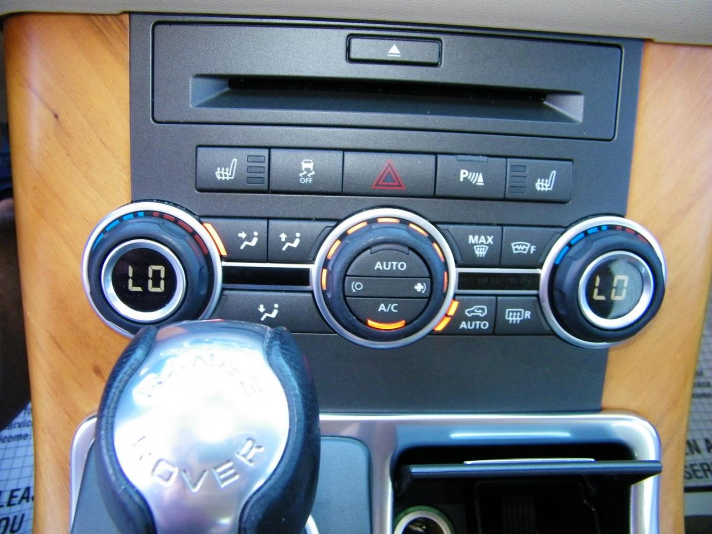 2011 Blue /Beige Land Rover Range Rover Sport HSE (SALSK2D43BA) with an 4.4L V8 DOHC 32V engine, 6-Speed Automatic transmission, located at 4000 Bee Ridge Road, Sarasota, FL, 34233, (941) 926-0300, 27.298664, -82.489151 - Photo#23