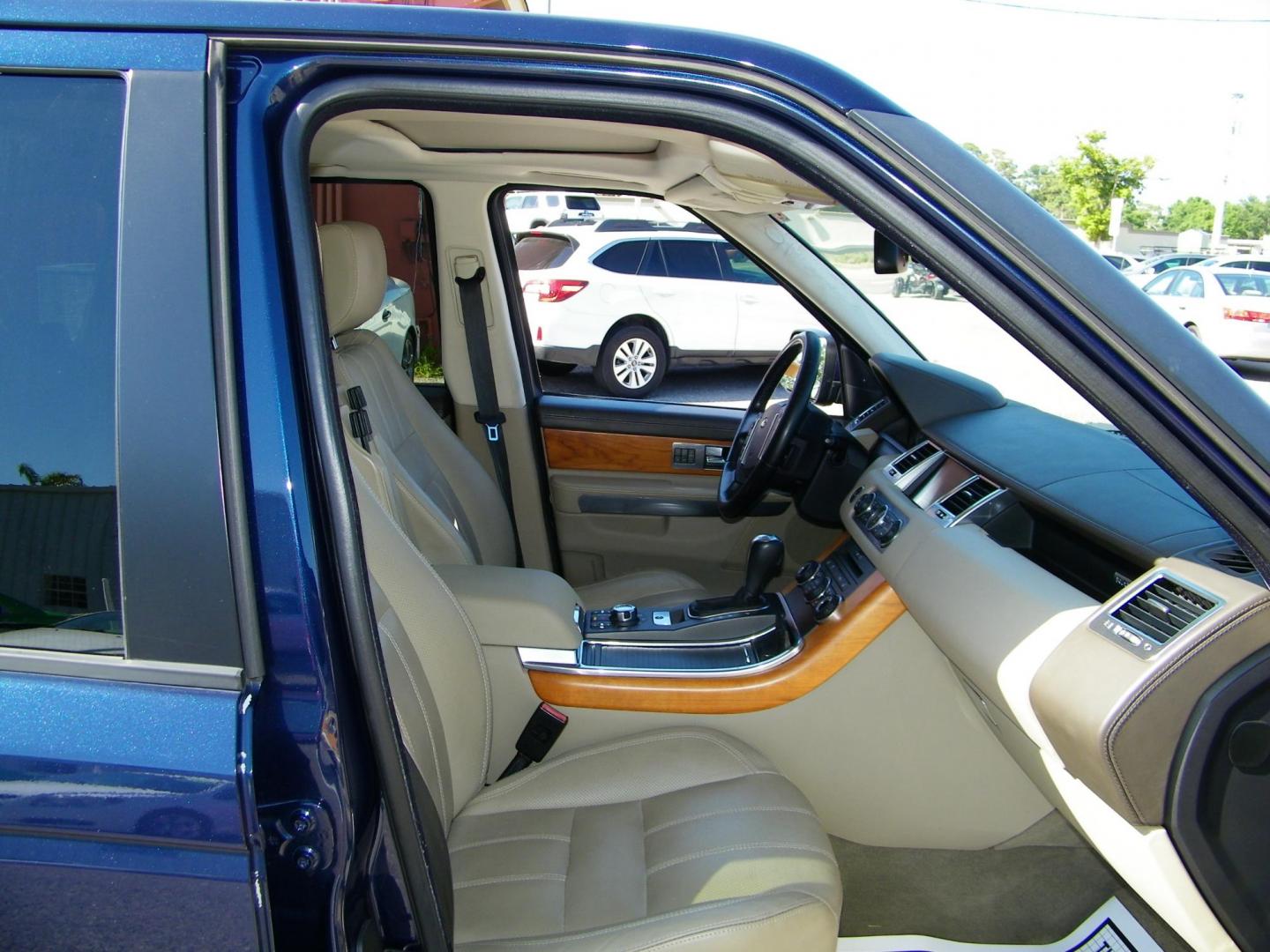 2011 Blue /Beige Land Rover Range Rover Sport HSE (SALSK2D43BA) with an 4.4L V8 DOHC 32V engine, 6-Speed Automatic transmission, located at 4000 Bee Ridge Road, Sarasota, FL, 34233, (941) 926-0300, 27.298664, -82.489151 - Photo#17