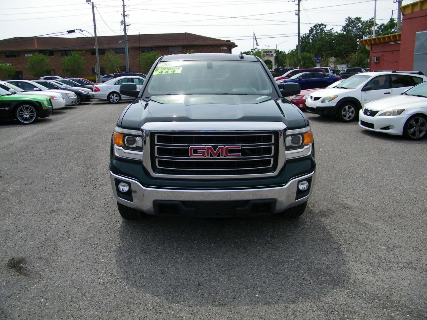 2015 Green /Black GMC Sierra 1500 SLE Double Cab 4WD (1GTV2UEC0FZ) with an 5.3L V8 OHV 16V engine, 6-Speed Automatic transmission, located at 4000 Bee Ridge Road, Sarasota, FL, 34233, (941) 926-0300, 27.298664, -82.489151 - Photo#1