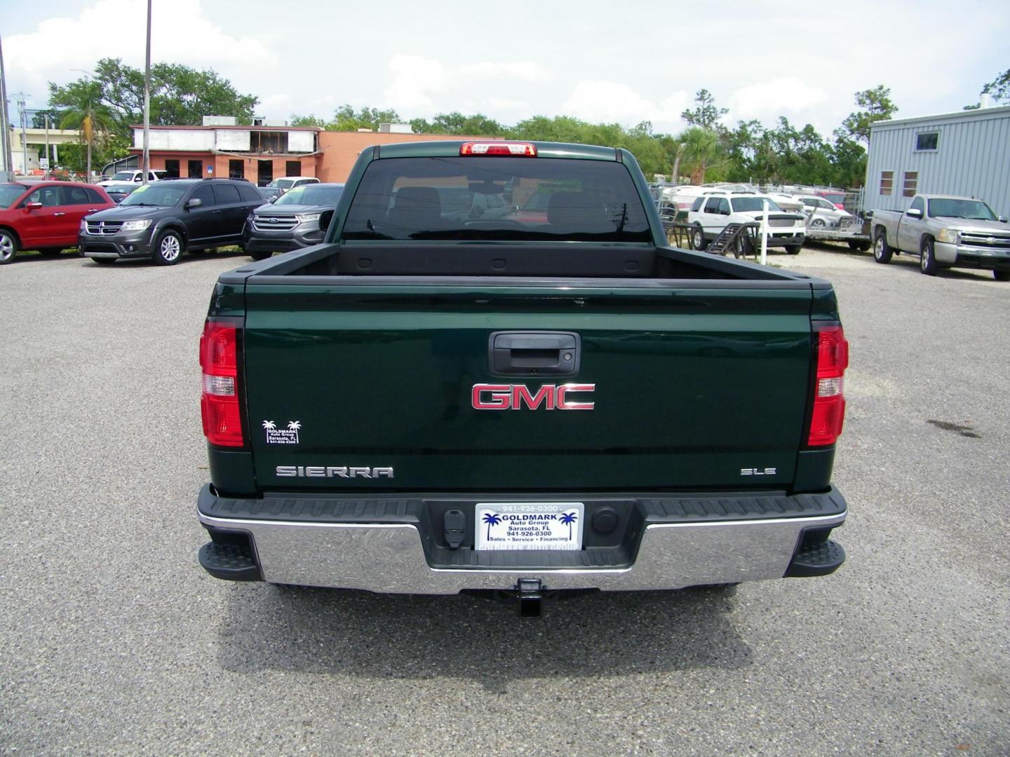 2015 Green /Black GMC Sierra 1500 SLE Double Cab 4WD (1GTV2UEC0FZ) with an 5.3L V8 OHV 16V engine, 6-Speed Automatic transmission, located at 4000 Bee Ridge Road, Sarasota, FL, 34233, (941) 926-0300, 27.298664, -82.489151 - Photo#4