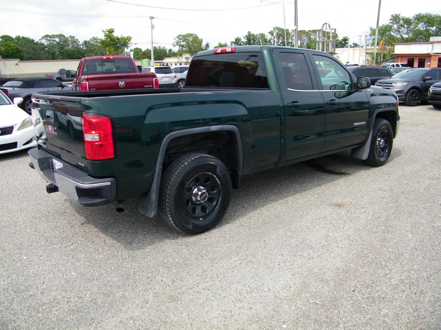 2015 Green /Black GMC Sierra 1500 SLE Double Cab 4WD (1GTV2UEC0FZ) with an 5.3L V8 OHV 16V engine, 6-Speed Automatic transmission, located at 4000 Bee Ridge Road, Sarasota, FL, 34233, (941) 926-0300, 27.298664, -82.489151 - Photo#6