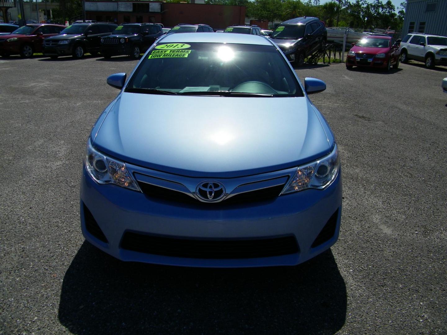 2013 Blue /Tan Toyota Camry SE (4T1BF1FKXDU) with an 2.5L L4 DOHC 16V engine, 6-Speed Automatic transmission, located at 4000 Bee Ridge Road, Sarasota, FL, 34233, (941) 926-0300, 27.298664, -82.489151 - Photo#1