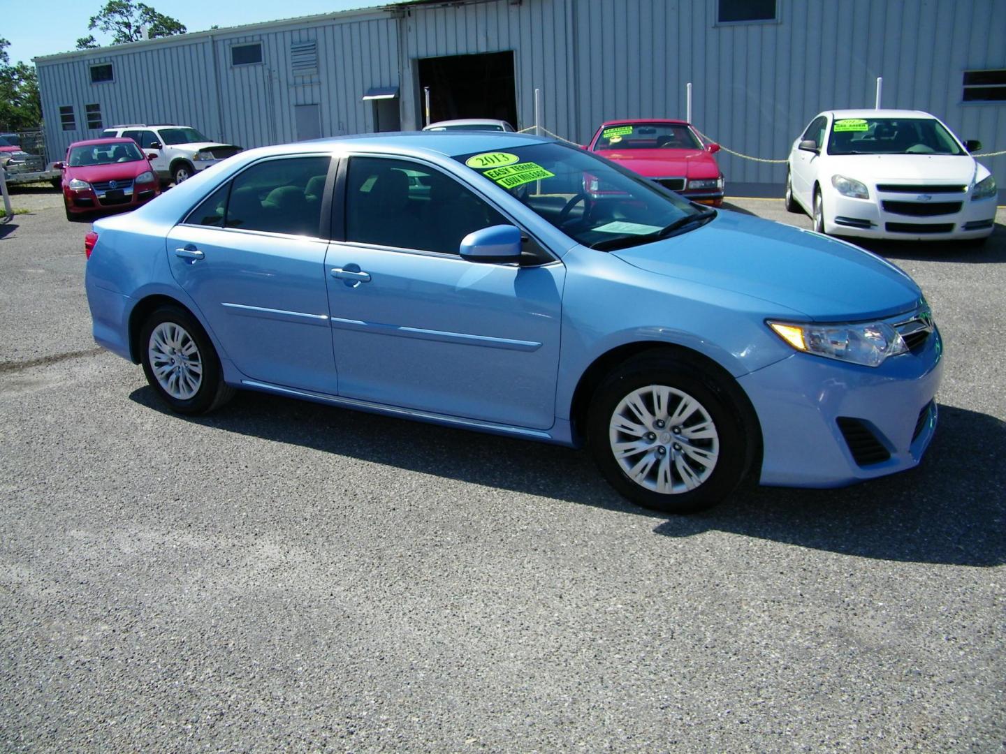 2013 Blue /Tan Toyota Camry SE (4T1BF1FKXDU) with an 2.5L L4 DOHC 16V engine, 6-Speed Automatic transmission, located at 4000 Bee Ridge Road, Sarasota, FL, 34233, (941) 926-0300, 27.298664, -82.489151 - Photo#7