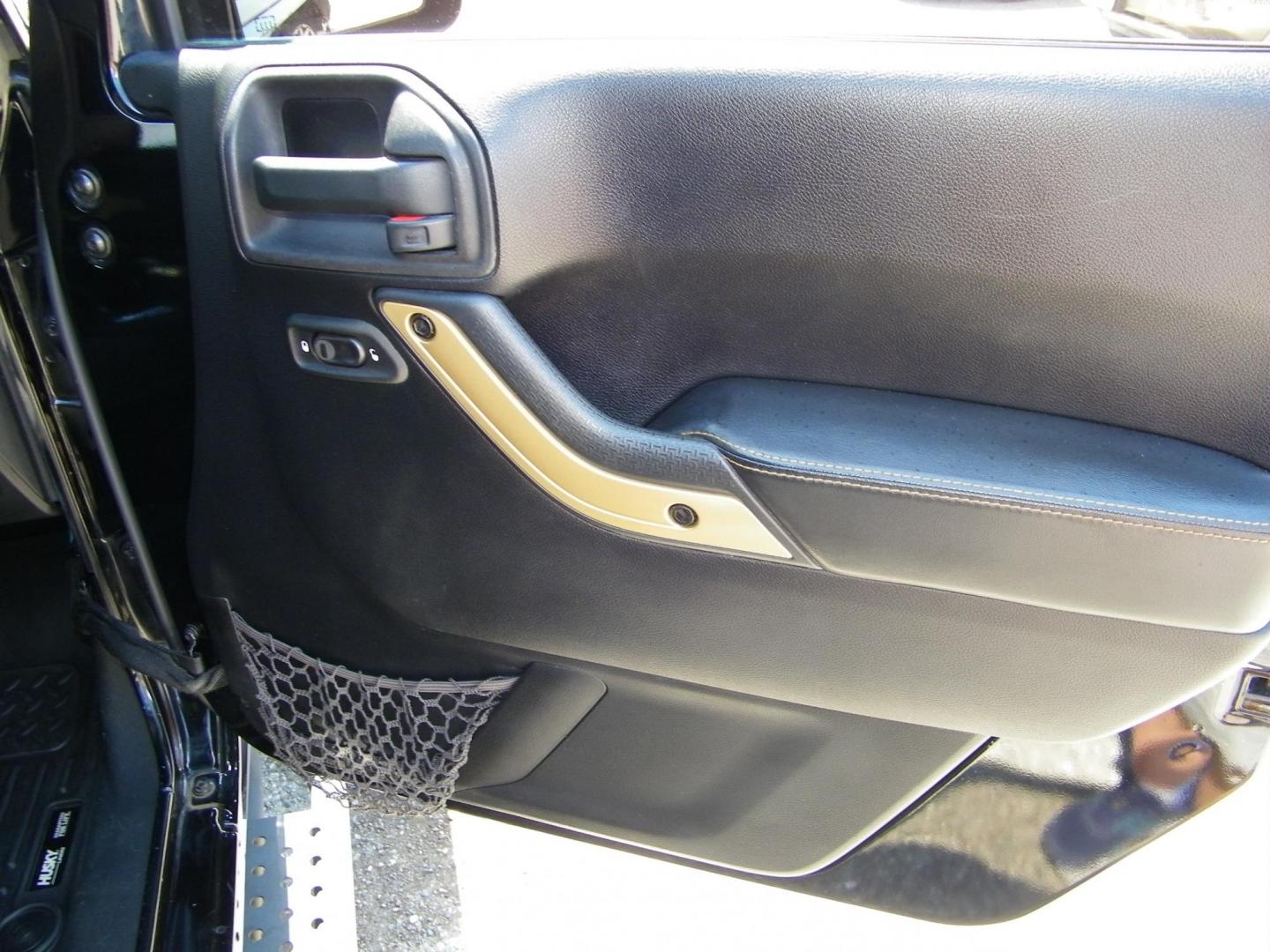 2014 Black /Black Jeep Wrangler Unlimited Sahara 4WD (1C4BJWEG2EL) with an 3.6L V6 DOHC 24V FFV engine, Automatic transmission, located at 4000 Bee Ridge Road, Sarasota, FL, 34233, (941) 926-0300, 27.298664, -82.489151 - Photo#13