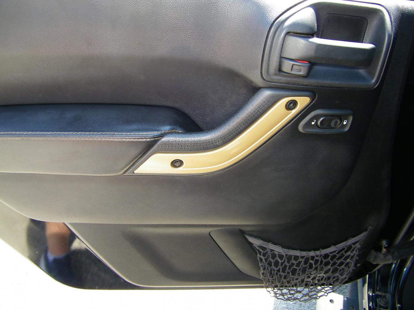 2014 Black /Black Jeep Wrangler Unlimited Sahara 4WD (1C4BJWEG2EL) with an 3.6L V6 DOHC 24V FFV engine, Automatic transmission, located at 4000 Bee Ridge Road, Sarasota, FL, 34233, (941) 926-0300, 27.298664, -82.489151 - Photo#15