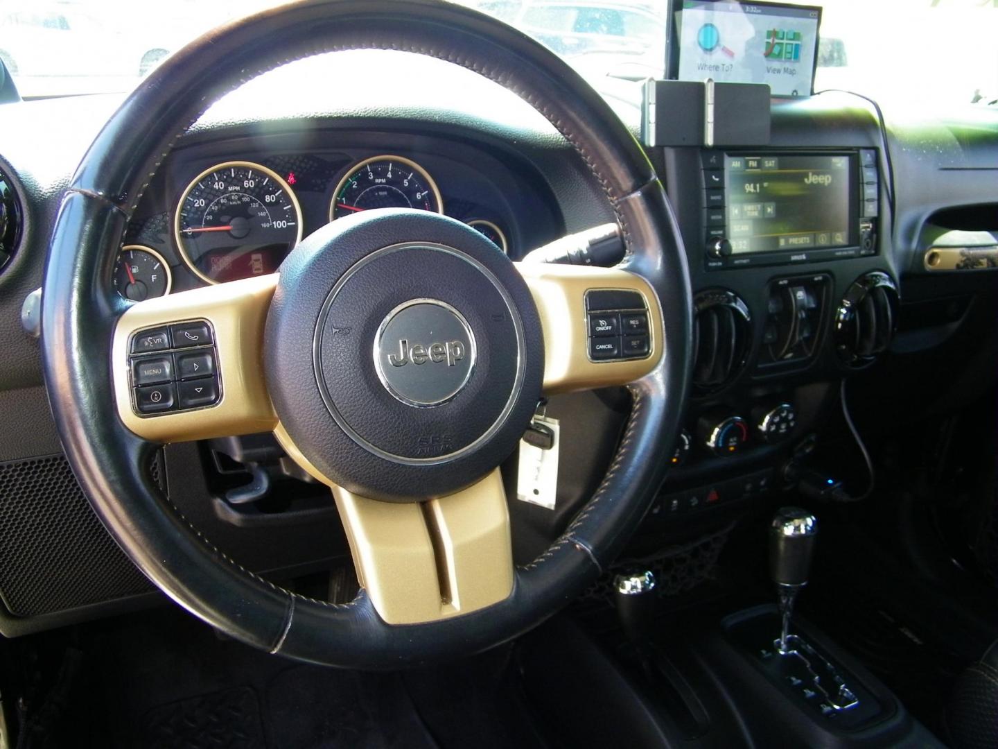 2014 Black /Black Jeep Wrangler Unlimited Sahara 4WD (1C4BJWEG2EL) with an 3.6L V6 DOHC 24V FFV engine, Automatic transmission, located at 4000 Bee Ridge Road, Sarasota, FL, 34233, (941) 926-0300, 27.298664, -82.489151 - Photo#17