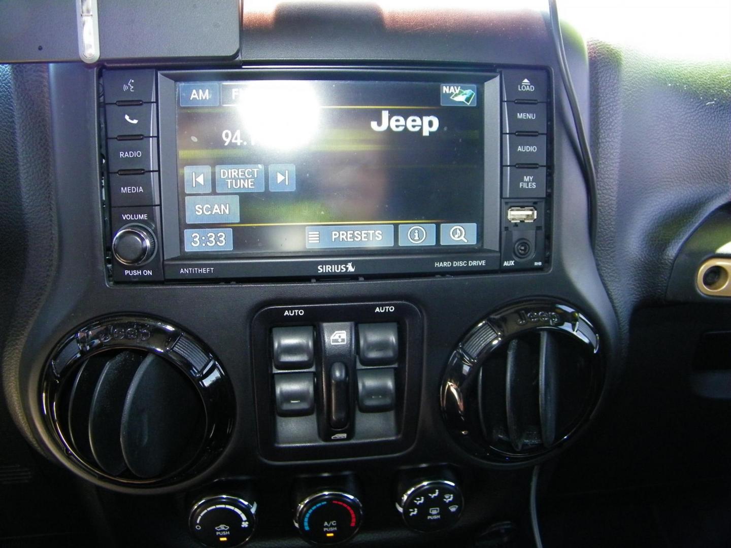 2014 Black /Black Jeep Wrangler Unlimited Sahara 4WD (1C4BJWEG2EL) with an 3.6L V6 DOHC 24V FFV engine, Automatic transmission, located at 4000 Bee Ridge Road, Sarasota, FL, 34233, (941) 926-0300, 27.298664, -82.489151 - Photo#22