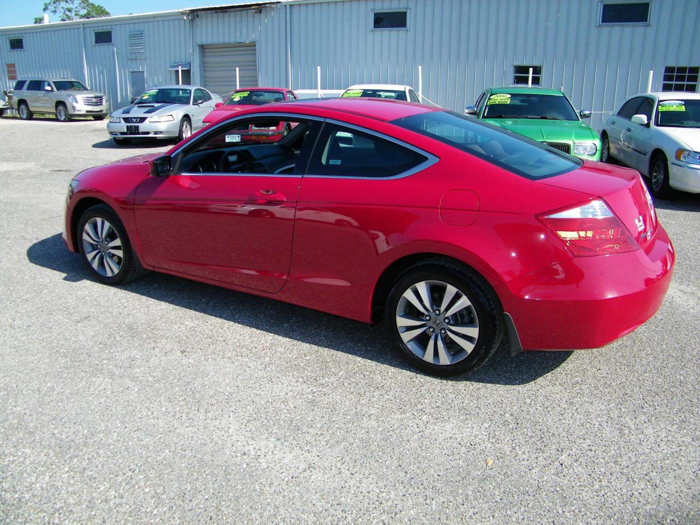 2009 Red /Black Honda Accord EX Coupe AT (1HGCS12759A) with an 2.4L L4 DOHC 16V engine, 5-Speed Automatic transmission, located at 4000 Bee Ridge Road, Sarasota, FL, 34233, (941) 926-0300, 27.298664, -82.489151 - Photo#3