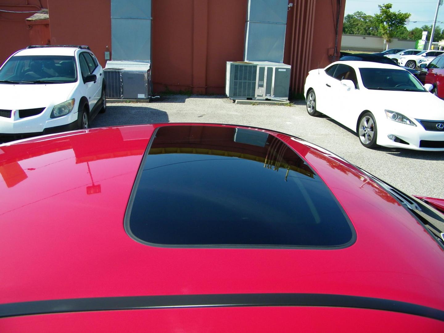 2009 Red /Black Honda Accord EX Coupe AT (1HGCS12759A) with an 2.4L L4 DOHC 16V engine, 5-Speed Automatic transmission, located at 4000 Bee Ridge Road, Sarasota, FL, 34233, (941) 926-0300, 27.298664, -82.489151 - Photo#8