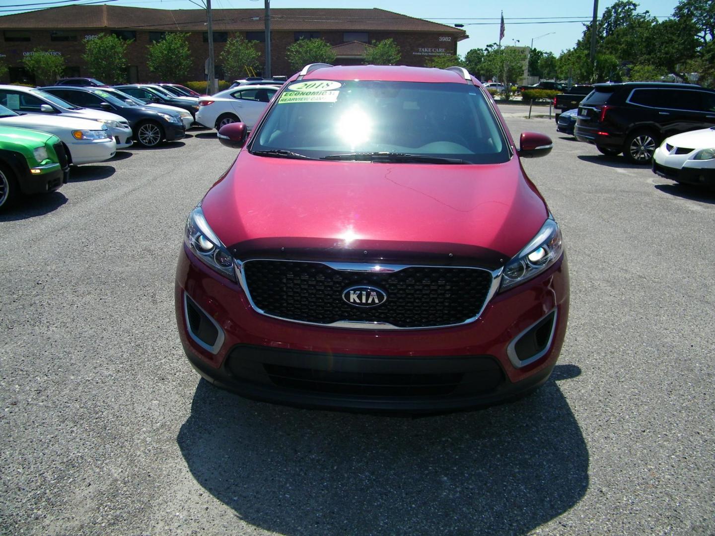 2018 Red /Black Kia Sorento LX 2WD (5XYPG4A36JG) with an 2.4L L4 DOHC 16V engine, 6A transmission, located at 4000 Bee Ridge Road, Sarasota, FL, 34233, (941) 926-0300, 27.298664, -82.489151 - Photo#1