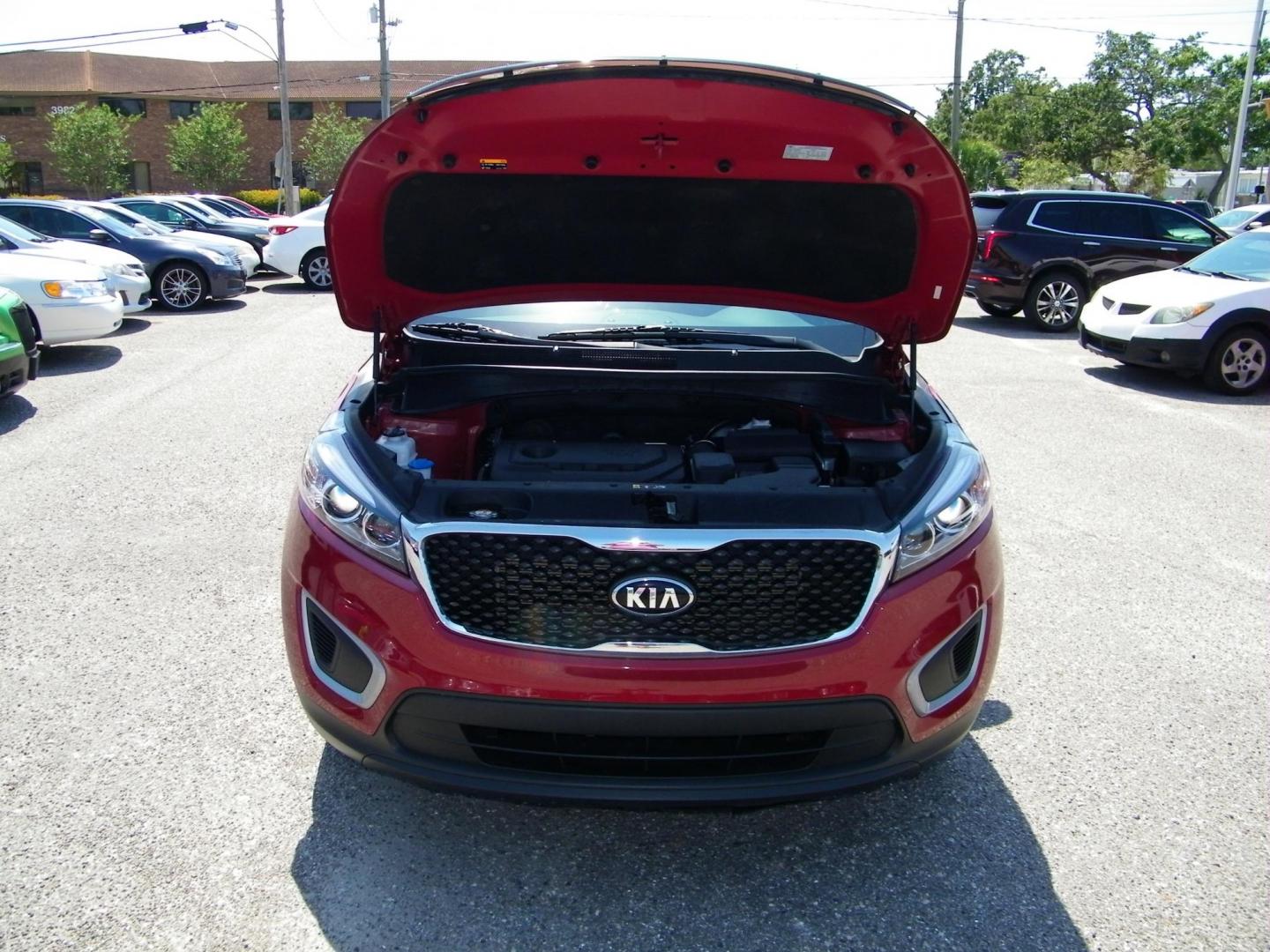 2018 Red /Black Kia Sorento LX 2WD (5XYPG4A36JG) with an 2.4L L4 DOHC 16V engine, 6A transmission, located at 4000 Bee Ridge Road, Sarasota, FL, 34233, (941) 926-0300, 27.298664, -82.489151 - Photo#8