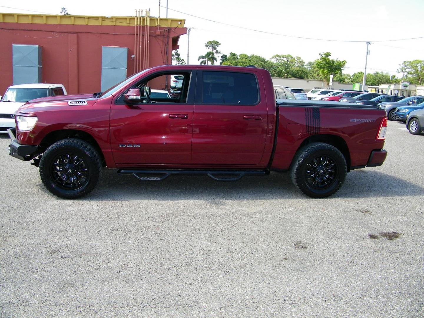 2020 Maroon /Black RAM 1500 Big Horn Crew Cab SWB 4WD (1C6SRFFT6LN) with an 5.7L V8 OHV 16V engine, 8A transmission, located at 4000 Bee Ridge Road, Sarasota, FL, 34233, (941) 926-0300, 27.298664, -82.489151 - Photo#2
