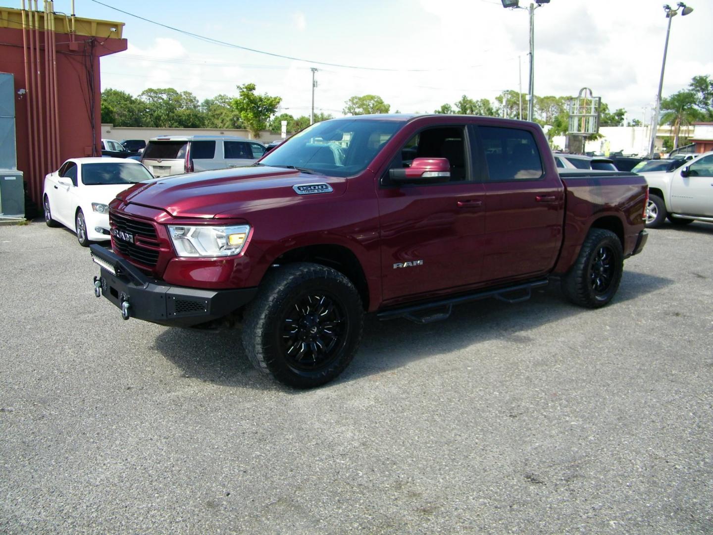 2020 Maroon /Black RAM 1500 Big Horn Crew Cab SWB 4WD (1C6SRFFT6LN) with an 5.7L V8 OHV 16V engine, 8A transmission, located at 4000 Bee Ridge Road, Sarasota, FL, 34233, (941) 926-0300, 27.298664, -82.489151 - Photo#0