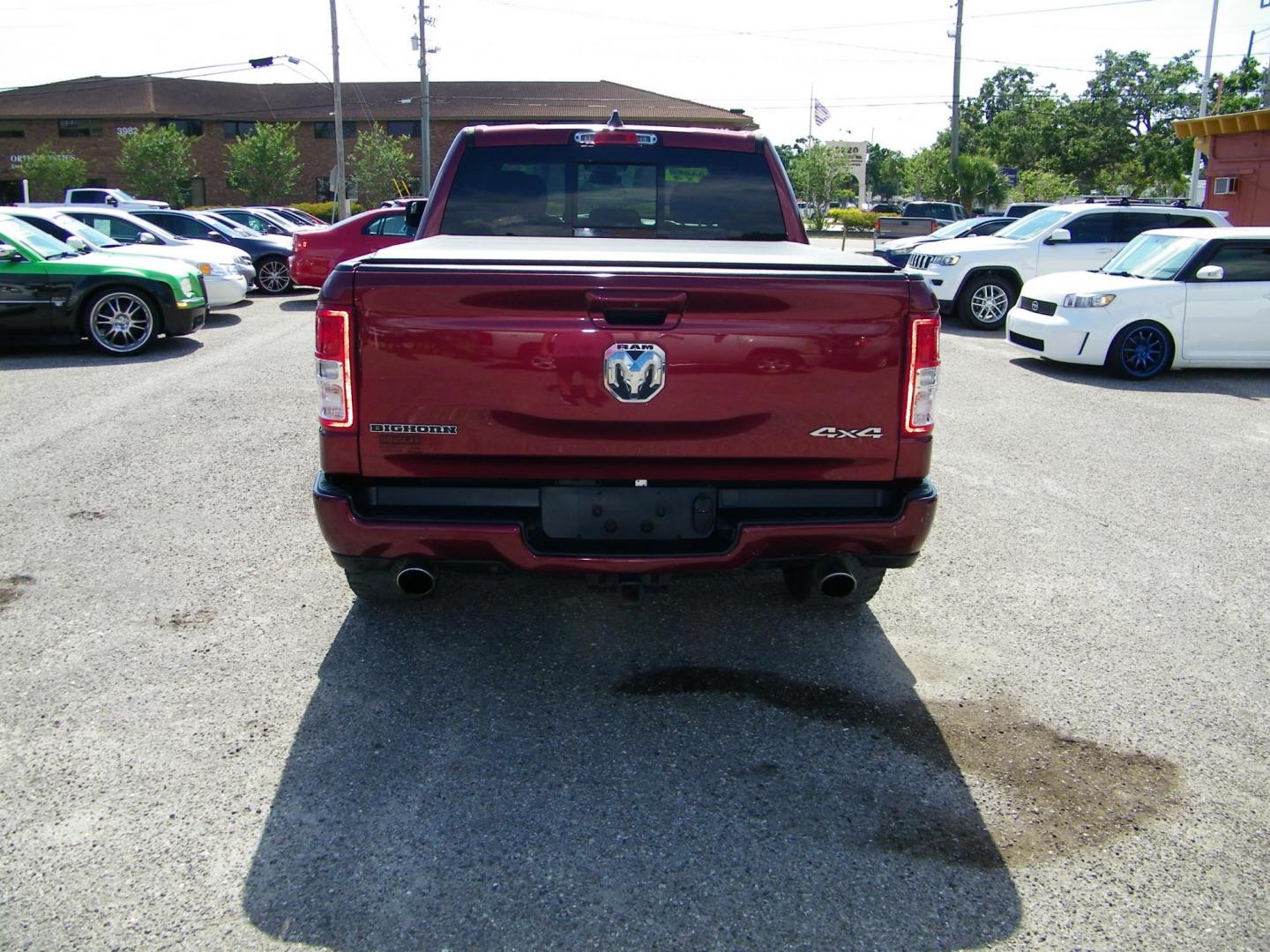 2020 Maroon /Black RAM 1500 Big Horn Crew Cab SWB 4WD (1C6SRFFT6LN) with an 5.7L V8 OHV 16V engine, 8A transmission, located at 4000 Bee Ridge Road, Sarasota, FL, 34233, (941) 926-0300, 27.298664, -82.489151 - Photo#4
