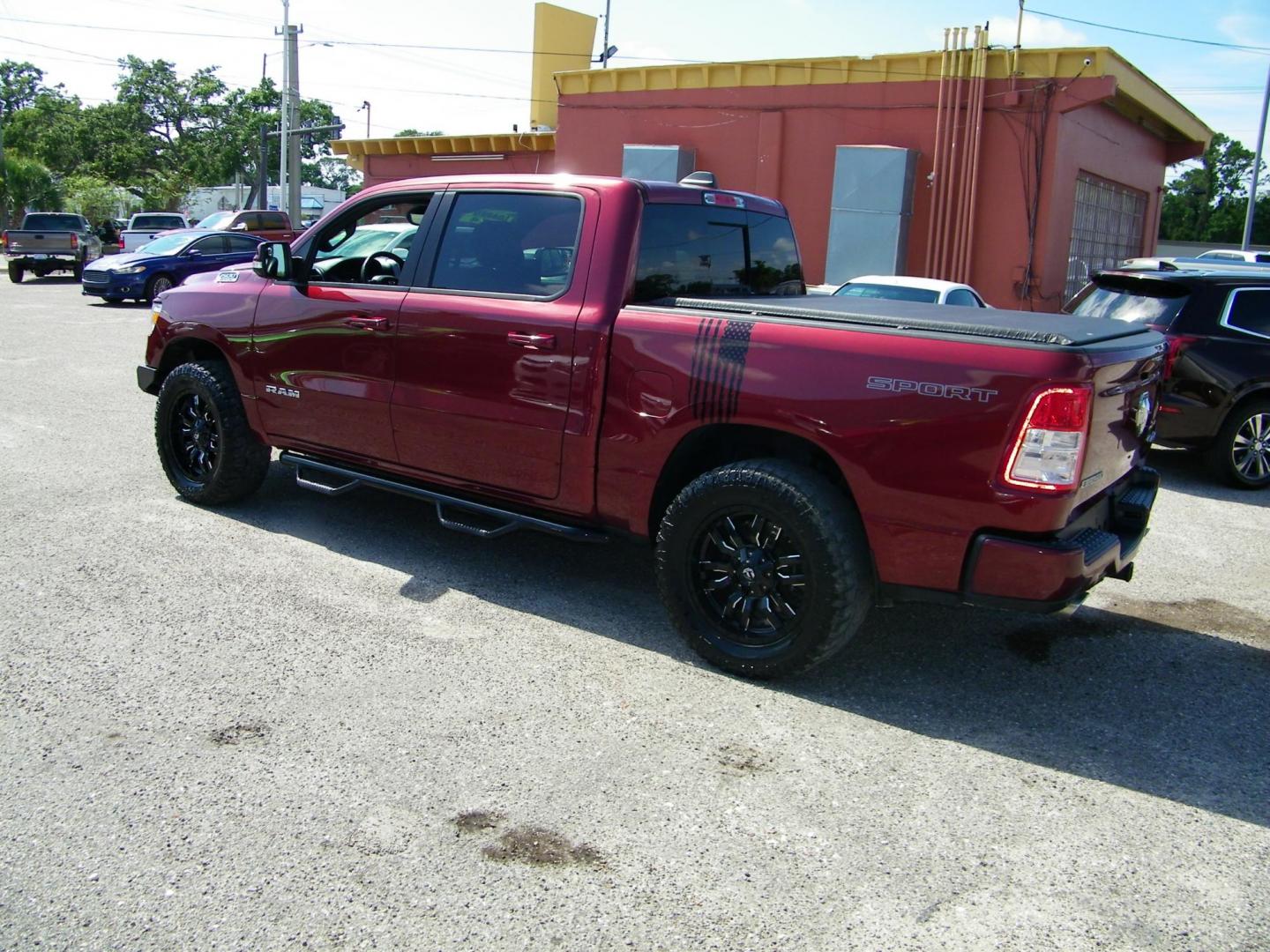 2020 Maroon /Black RAM 1500 Big Horn Crew Cab SWB 4WD (1C6SRFFT6LN) with an 5.7L V8 OHV 16V engine, 8A transmission, located at 4000 Bee Ridge Road, Sarasota, FL, 34233, (941) 926-0300, 27.298664, -82.489151 - Photo#3
