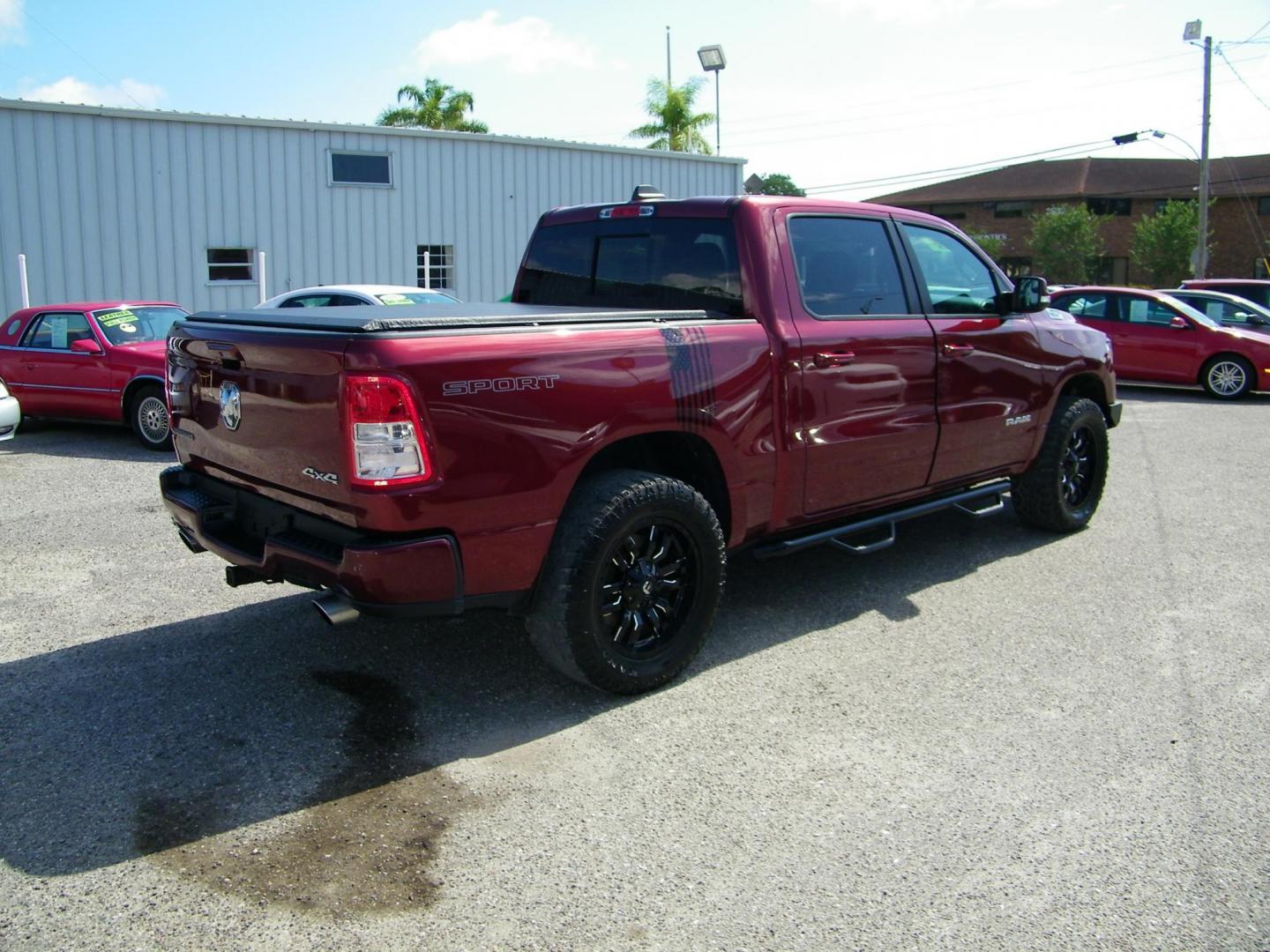 2020 Maroon /Black RAM 1500 Big Horn Crew Cab SWB 4WD (1C6SRFFT6LN) with an 5.7L V8 OHV 16V engine, 8A transmission, located at 4000 Bee Ridge Road, Sarasota, FL, 34233, (941) 926-0300, 27.298664, -82.489151 - Photo#6