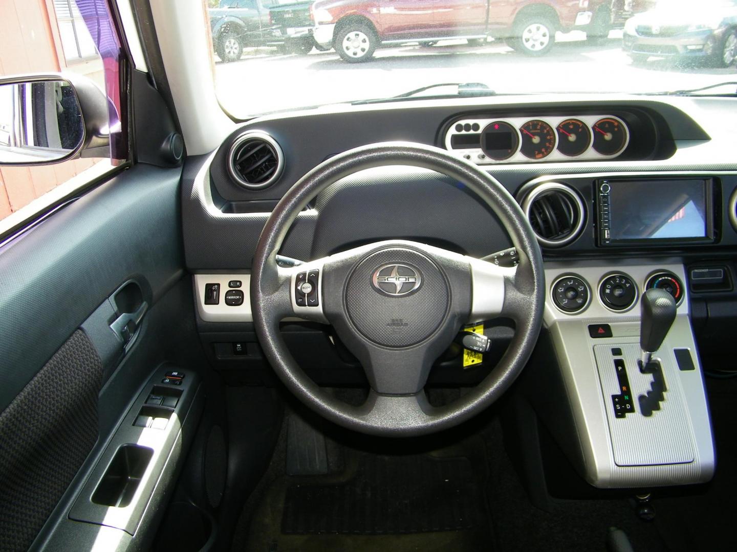 2009 White /Black Scion xB Wagon (JTLKE50E791) with an 2.4L L4 DOHC 16V engine, Automatic transmission, located at 4000 Bee Ridge Road, Sarasota, FL, 34233, (941) 926-0300, 27.298664, -82.489151 - Photo#10