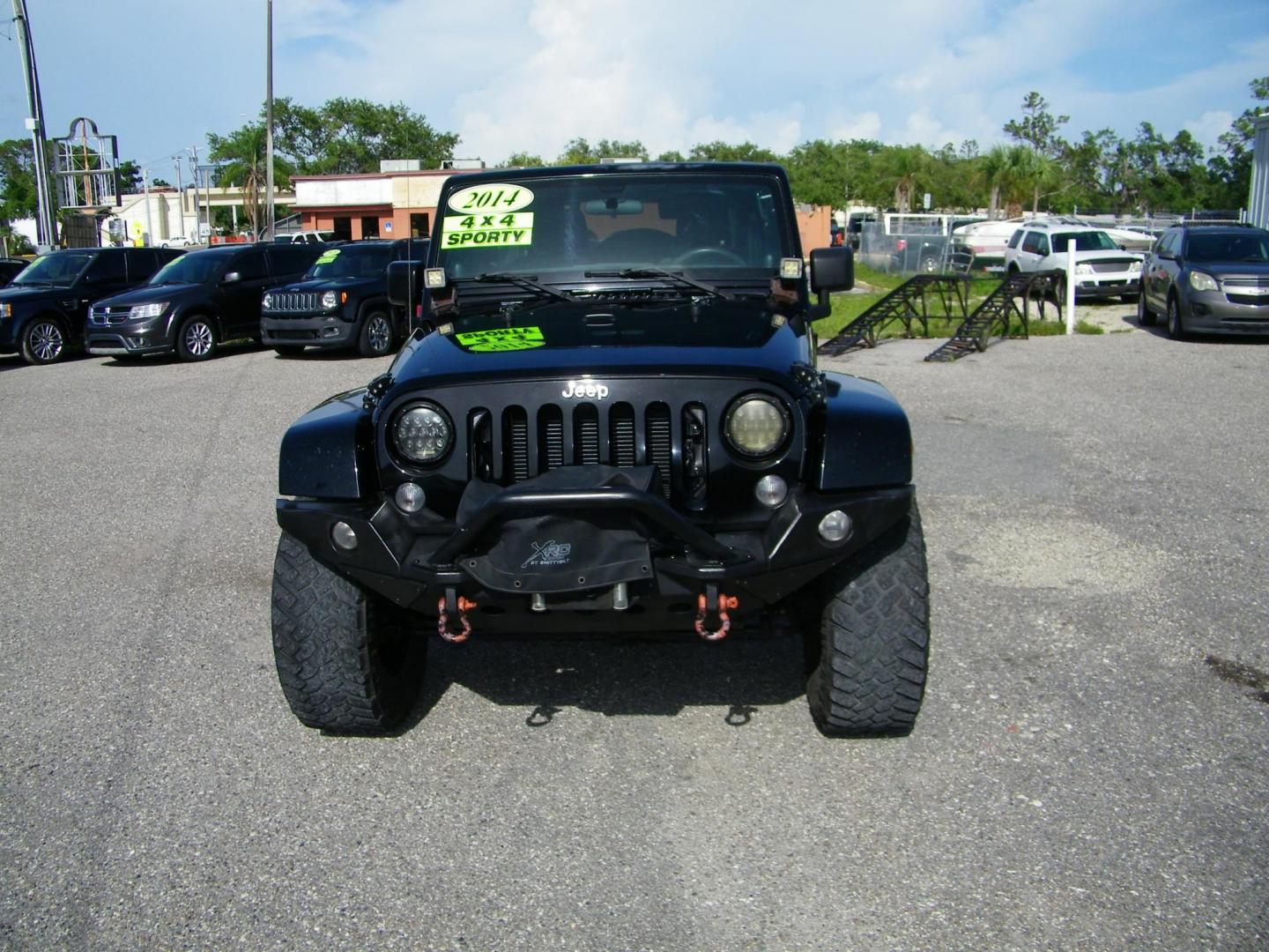 2014 Black /Black Jeep Wrangler Unlimited Sport 4WD (1C4BJWDG5EL) with an 3.6L V6 DOHC 24V FFV engine, Automatic transmission, located at 4000 Bee Ridge Road, Sarasota, FL, 34233, (941) 926-0300, 27.298664, -82.489151 - Photo#1
