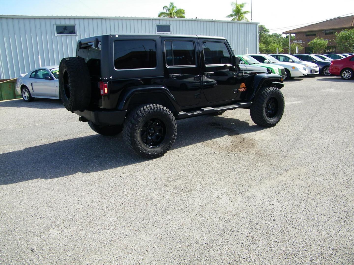 2014 Black /Black Jeep Wrangler Unlimited Sport 4WD (1C4BJWDG5EL) with an 3.6L V6 DOHC 24V FFV engine, Automatic transmission, located at 4000 Bee Ridge Road, Sarasota, FL, 34233, (941) 926-0300, 27.298664, -82.489151 - Photo#5