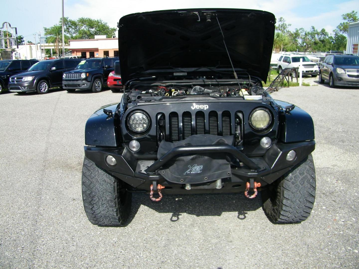 2014 Black /Black Jeep Wrangler Unlimited Sport 4WD (1C4BJWDG5EL) with an 3.6L V6 DOHC 24V FFV engine, Automatic transmission, located at 4000 Bee Ridge Road, Sarasota, FL, 34233, (941) 926-0300, 27.298664, -82.489151 - Photo#8