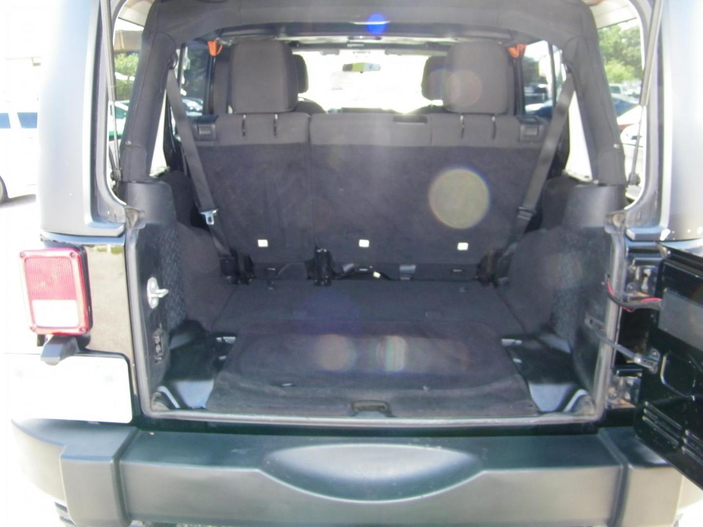 2014 Black /Black Jeep Wrangler Unlimited Sport 4WD (1C4BJWDG5EL) with an 3.6L V6 DOHC 24V FFV engine, Automatic transmission, located at 4000 Bee Ridge Road, Sarasota, FL, 34233, (941) 926-0300, 27.298664, -82.489151 - Photo#11