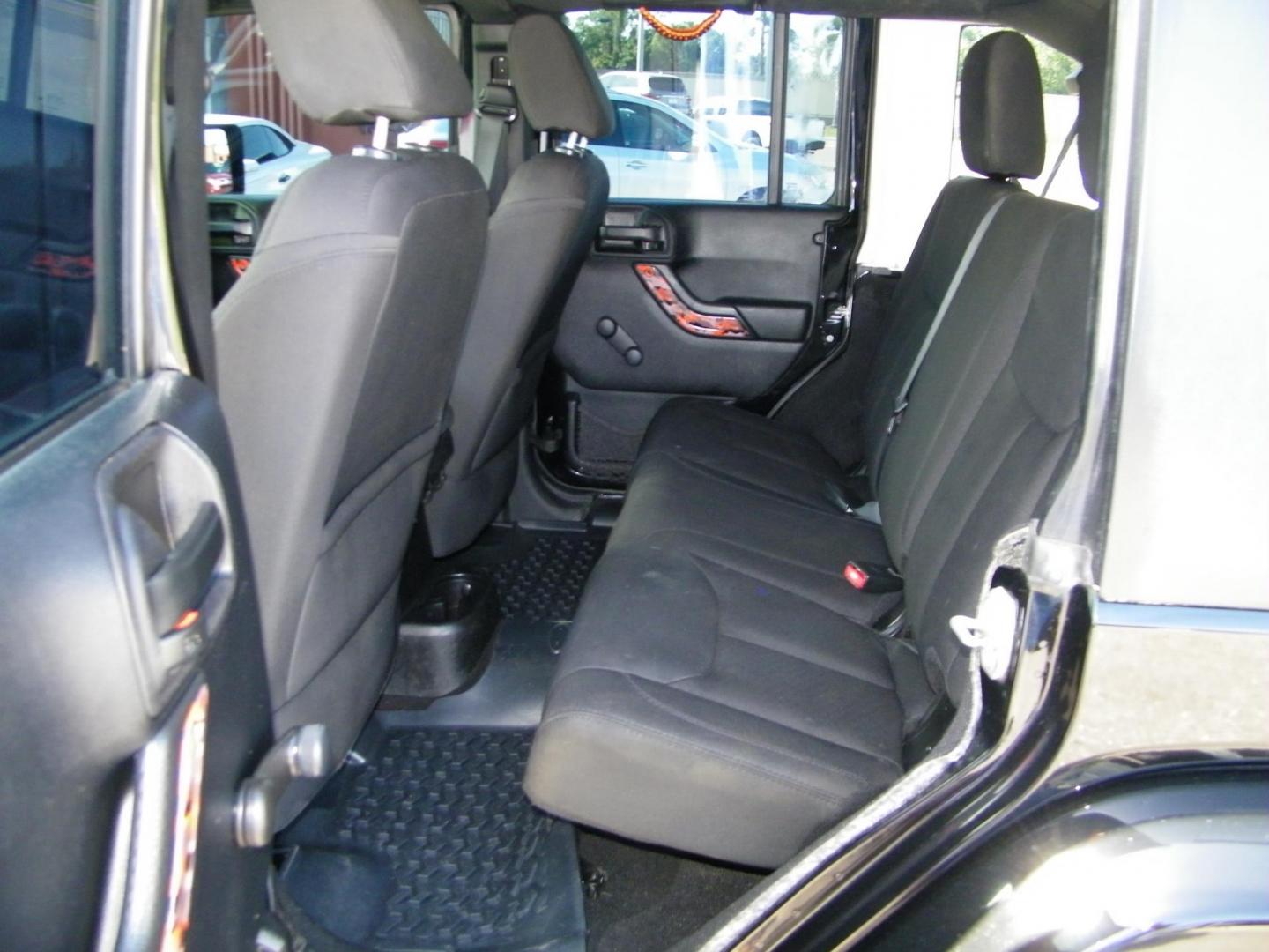 2014 Black /Black Jeep Wrangler Unlimited Sport 4WD (1C4BJWDG5EL) with an 3.6L V6 DOHC 24V FFV engine, Automatic transmission, located at 4000 Bee Ridge Road, Sarasota, FL, 34233, (941) 926-0300, 27.298664, -82.489151 - Photo#10