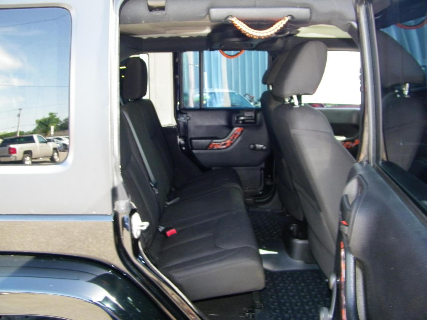 2014 Black /Black Jeep Wrangler Unlimited Sport 4WD (1C4BJWDG5EL) with an 3.6L V6 DOHC 24V FFV engine, Automatic transmission, located at 4000 Bee Ridge Road, Sarasota, FL, 34233, (941) 926-0300, 27.298664, -82.489151 - Photo#12