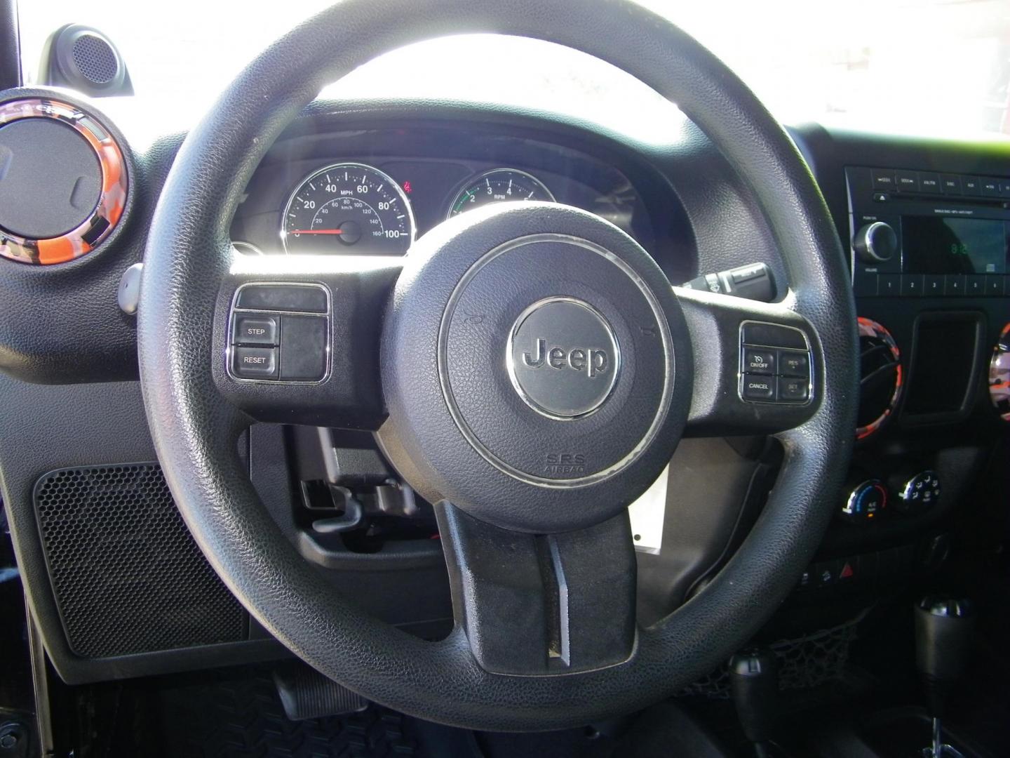 2014 Black /Black Jeep Wrangler Unlimited Sport 4WD (1C4BJWDG5EL) with an 3.6L V6 DOHC 24V FFV engine, Automatic transmission, located at 4000 Bee Ridge Road, Sarasota, FL, 34233, (941) 926-0300, 27.298664, -82.489151 - Photo#17