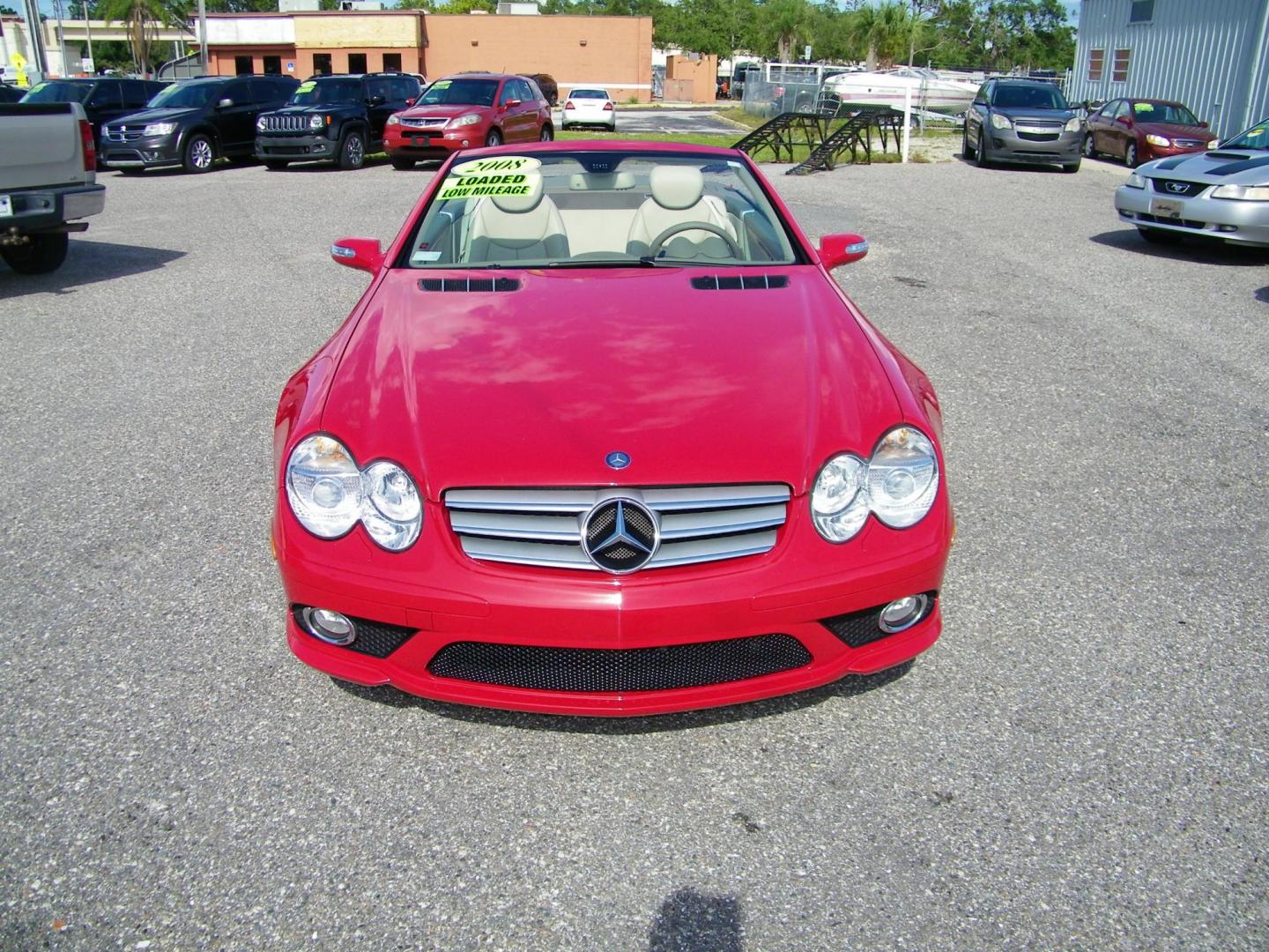 2008 Red /Beige Mercedes-Benz SL-Class SL550 (WDBSK71F98F) with an 5.5L V8 DOHC 32V engine, 7-Speed Automatic Overdrive transmission, located at 4000 Bee Ridge Road, Sarasota, FL, 34233, (941) 926-0300, 27.298664, -82.489151 - Photo#1