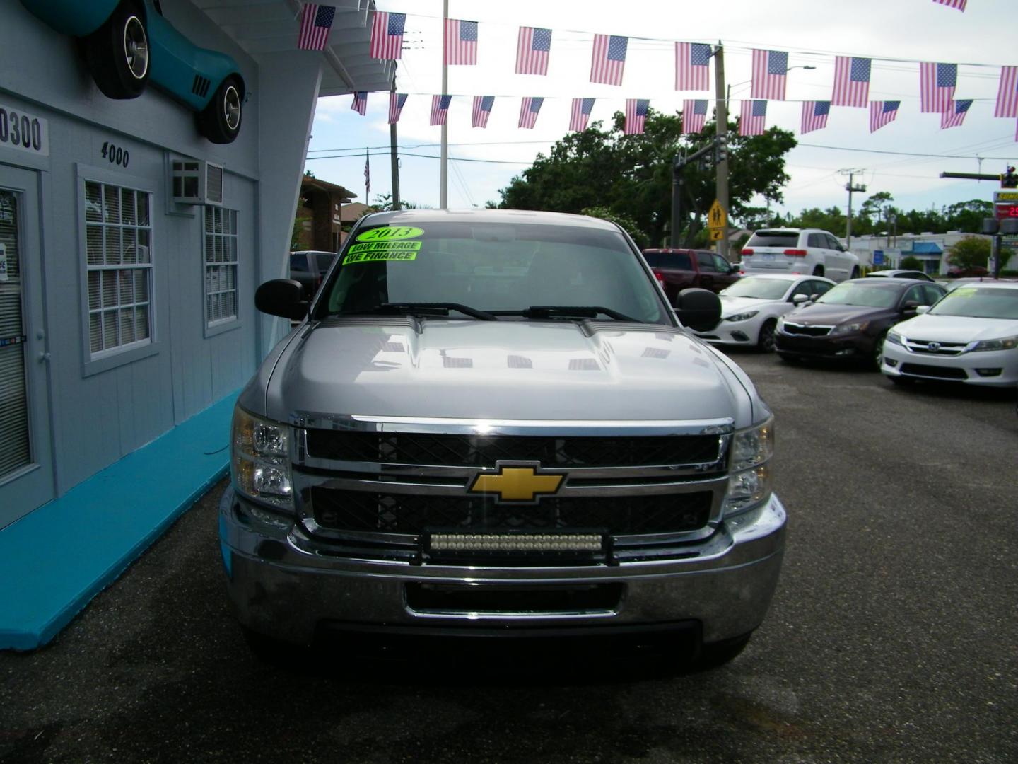 2013 Silver /Gray Chevrolet Silverado 2500HD Work Truck Ext. Cab 4WD (1GC2KVCG5DZ) with an 6.0L V8 OHV 16V FFV engine, 6-Speed Automatic transmission, located at 4000 Bee Ridge Road, Sarasota, FL, 34233, (941) 926-0300, 27.298664, -82.489151 - Photo#1