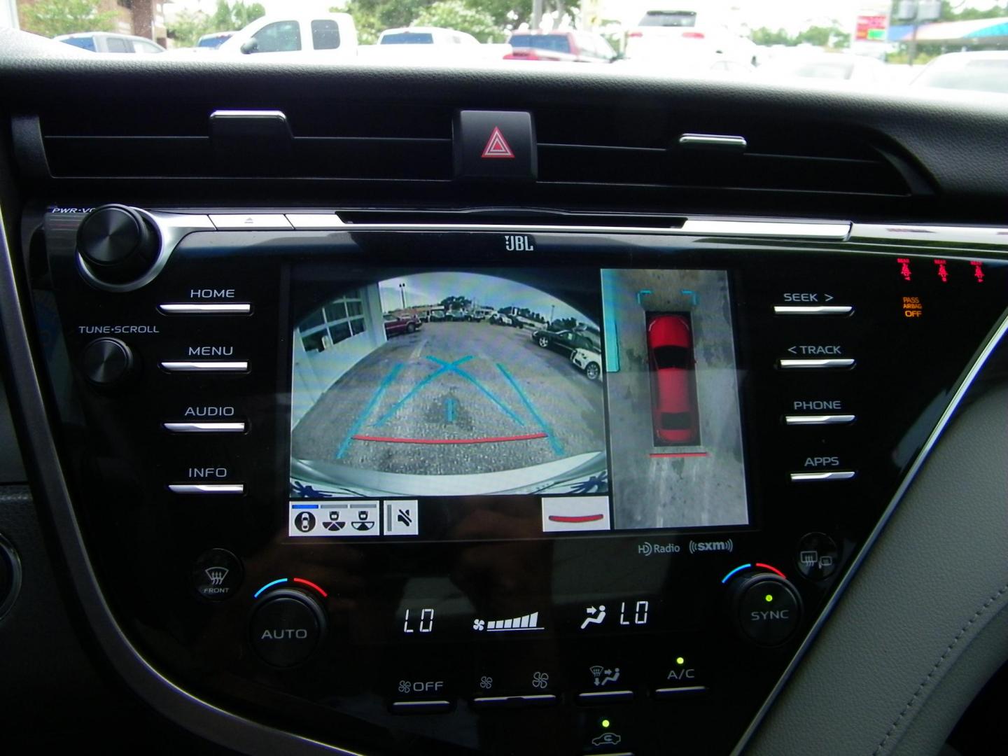 2018 Silver /Black Toyota Camry LE (4T1B11HK1JU) with an 2.5L L4 DOHC 16V engine, 8A transmission, located at 4000 Bee Ridge Road, Sarasota, FL, 34233, (941) 926-0300, 27.298664, -82.489151 - Photo#12