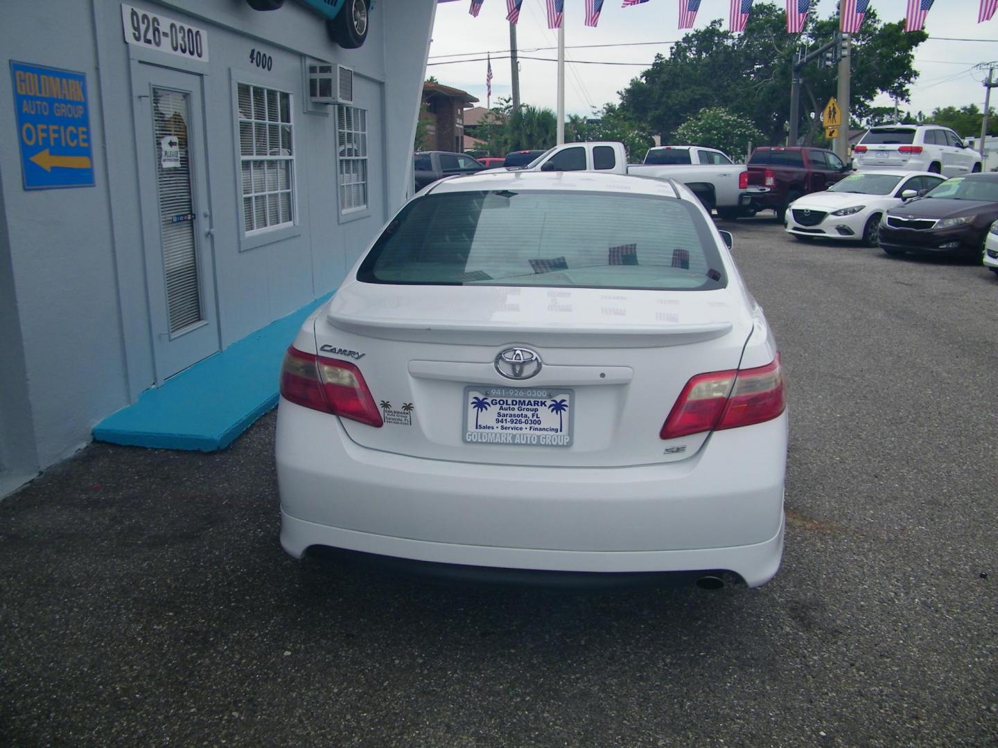 2009 White /Grey Toyota Camry CE 5-Spd AT (4T1BE46K99U) with an 2.4L L4 DOHC 16V engine, 5-Speed Automatic Overdrive transmission, located at 4000 Bee Ridge Road, Sarasota, FL, 34233, (941) 926-0300, 27.298664, -82.489151 - Photo#2