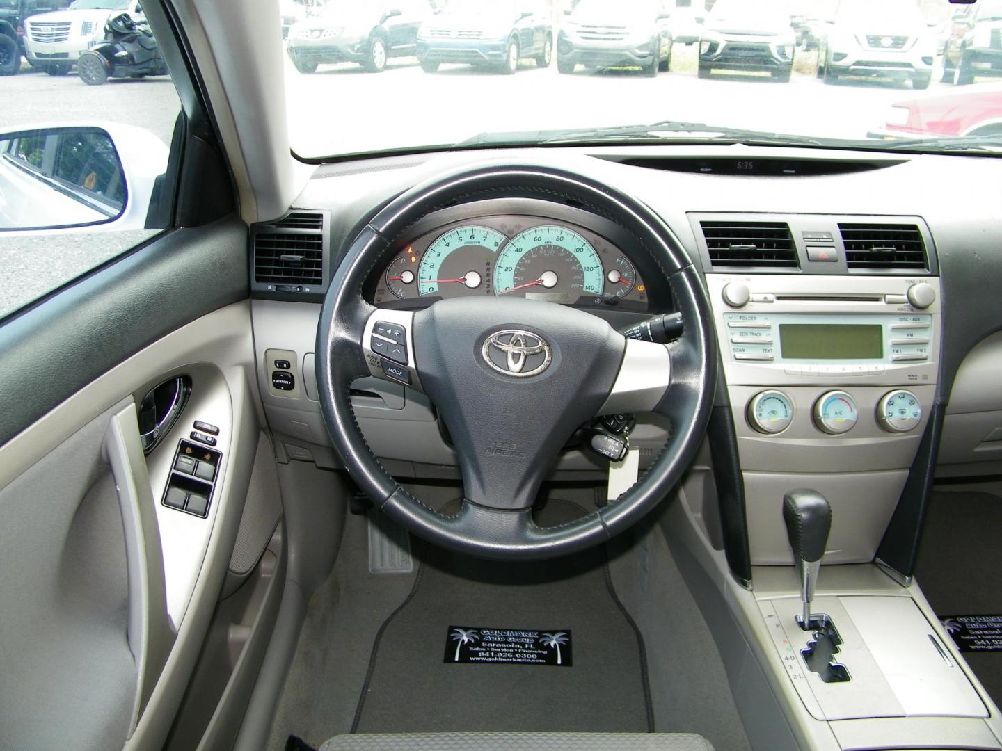 2009 White /Grey Toyota Camry CE 5-Spd AT (4T1BE46K99U) with an 2.4L L4 DOHC 16V engine, 5-Speed Automatic Overdrive transmission, located at 4000 Bee Ridge Road, Sarasota, FL, 34233, (941) 926-0300, 27.298664, -82.489151 - Photo#11