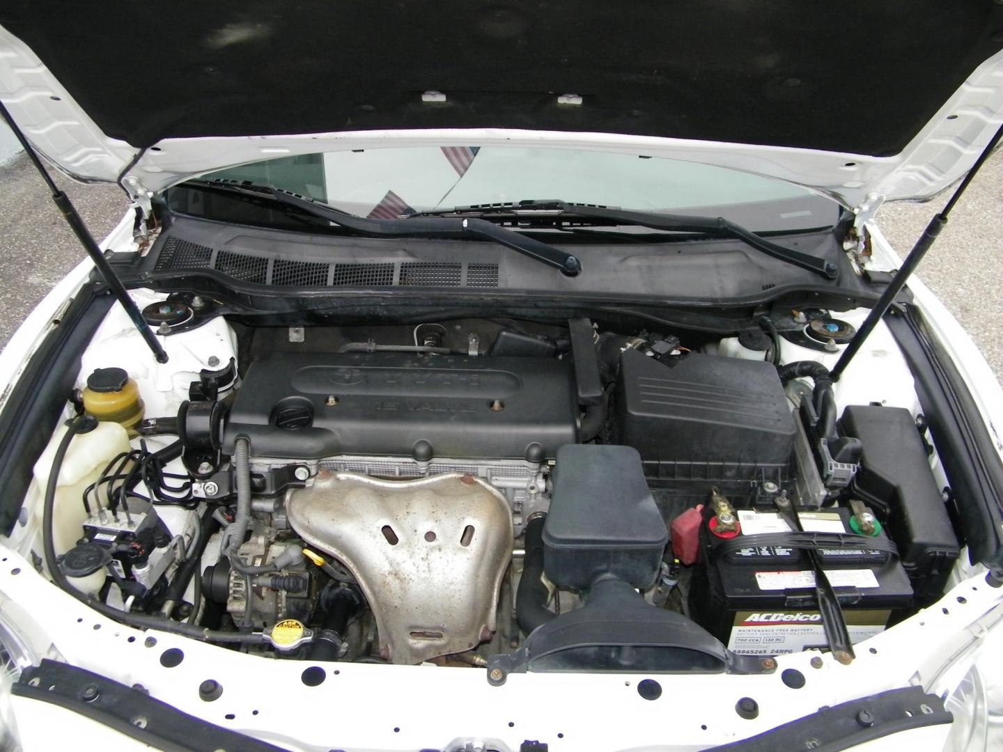 2009 White /Grey Toyota Camry CE 5-Spd AT (4T1BE46K99U) with an 2.4L L4 DOHC 16V engine, 5-Speed Automatic Overdrive transmission, located at 4000 Bee Ridge Road, Sarasota, FL, 34233, (941) 926-0300, 27.298664, -82.489151 - Photo#14