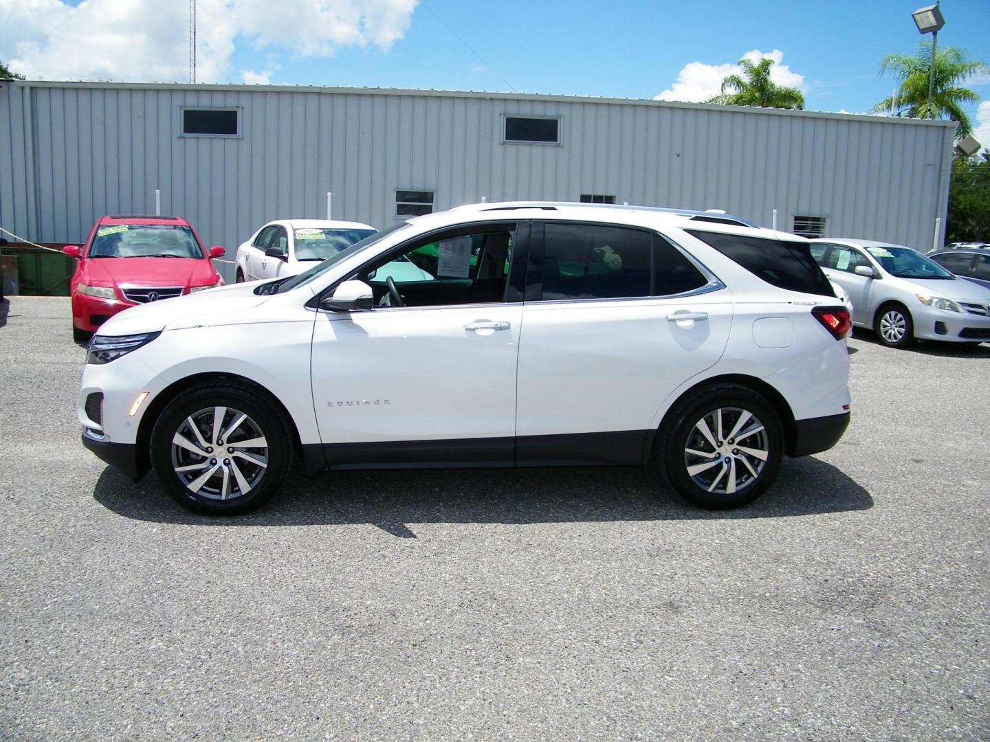 2022 White /Black Chevrolet Equinox Premier (3GNAXNEV8NS) with an 1.5L L4 DOHC 16V TURBO engine, 6A transmission, located at 4000 Bee Ridge Road, Sarasota, FL, 34233, (941) 926-0300, 27.298664, -82.489151 - Photo#2