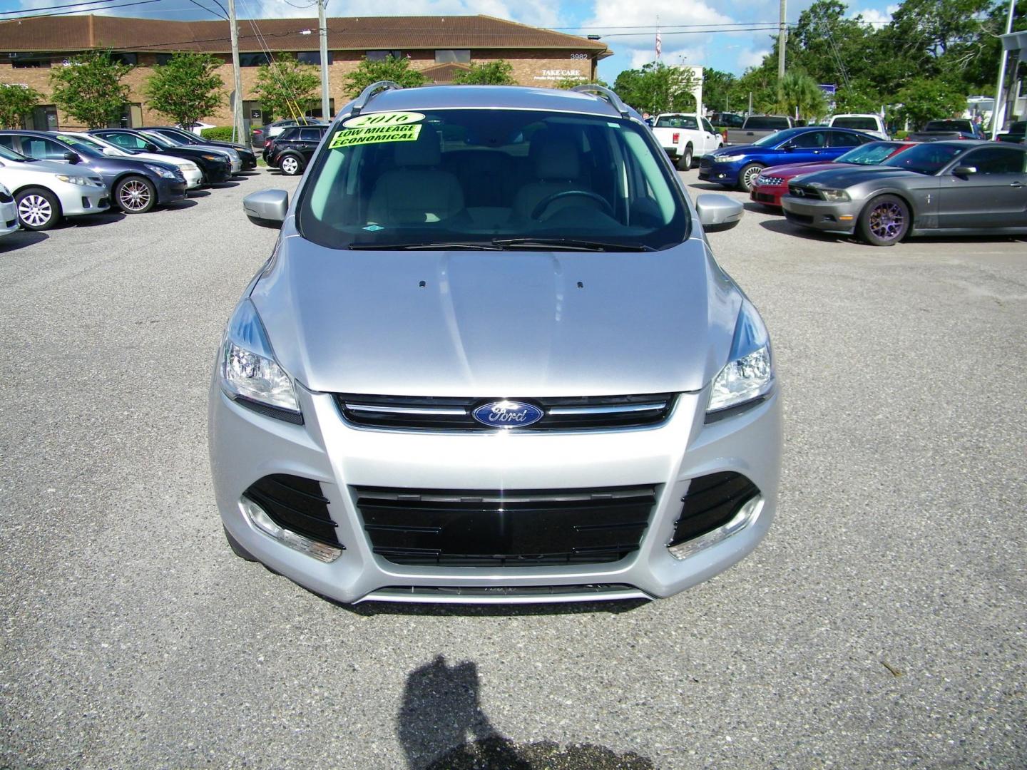 2016 Silver /Beige Ford Escape Titanium FWD (1FMCU0J95GU) with an 2.0L L4 DOHC 16V engine, 6-Speed Automatic transmission, located at 4000 Bee Ridge Road, Sarasota, FL, 34233, (941) 926-0300, 27.298664, -82.489151 - Photo#1