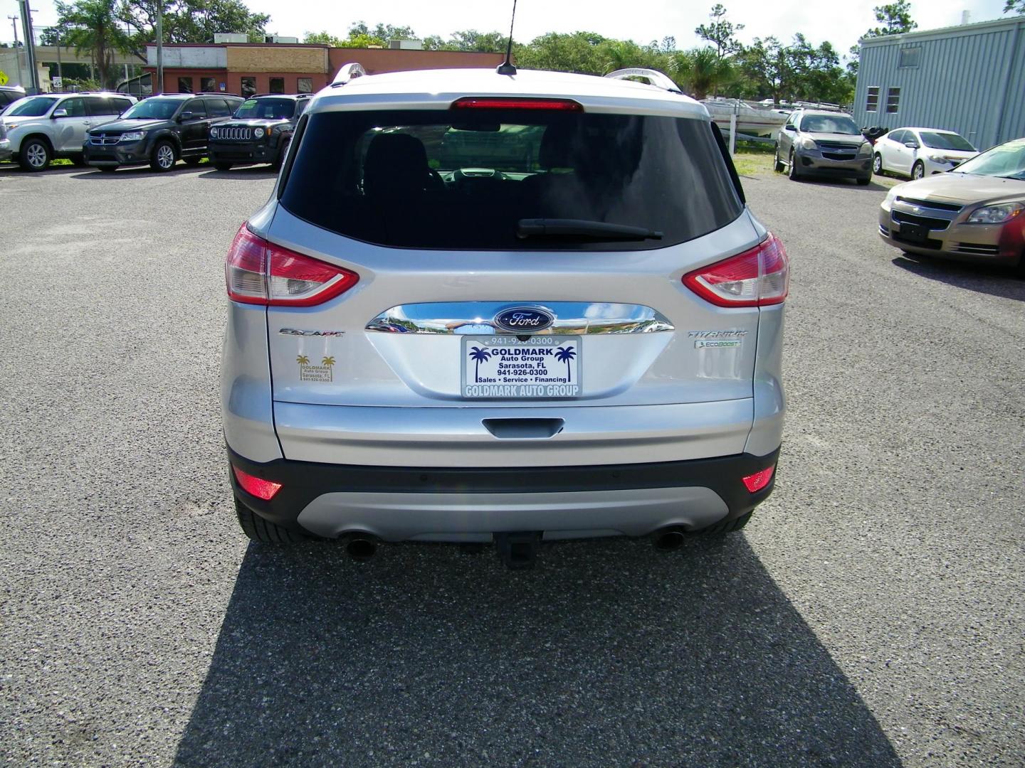 2016 Silver /Beige Ford Escape Titanium FWD (1FMCU0J95GU) with an 2.0L L4 DOHC 16V engine, 6-Speed Automatic transmission, located at 4000 Bee Ridge Road, Sarasota, FL, 34233, (941) 926-0300, 27.298664, -82.489151 - Photo#4