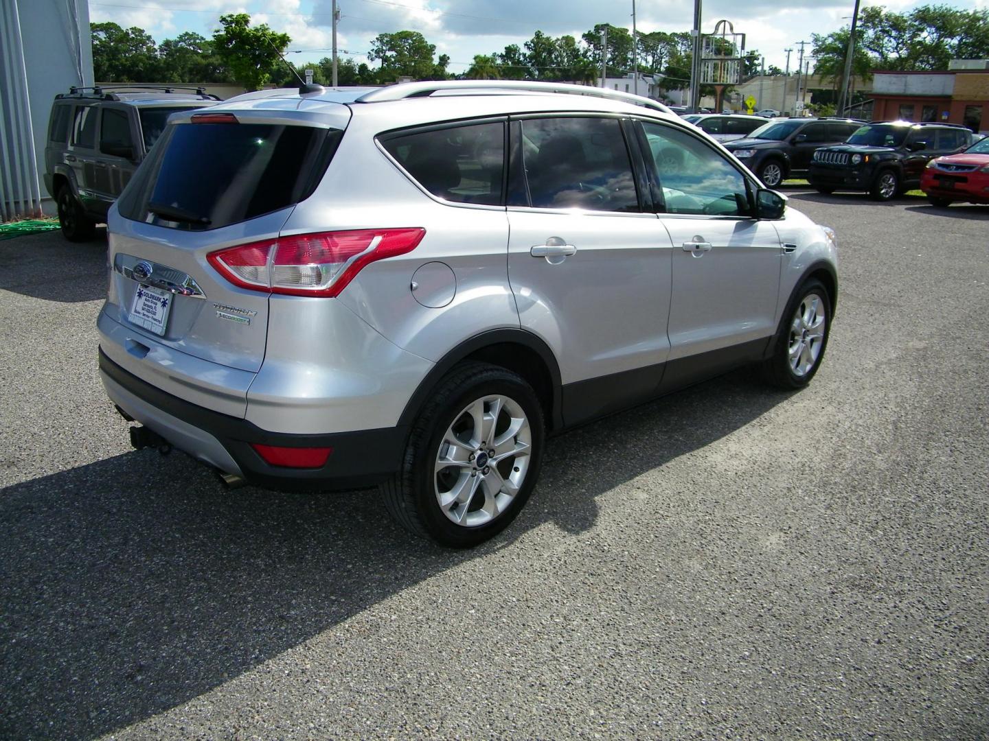 2016 Silver /Beige Ford Escape Titanium FWD (1FMCU0J95GU) with an 2.0L L4 DOHC 16V engine, 6-Speed Automatic transmission, located at 4000 Bee Ridge Road, Sarasota, FL, 34233, (941) 926-0300, 27.298664, -82.489151 - Photo#5