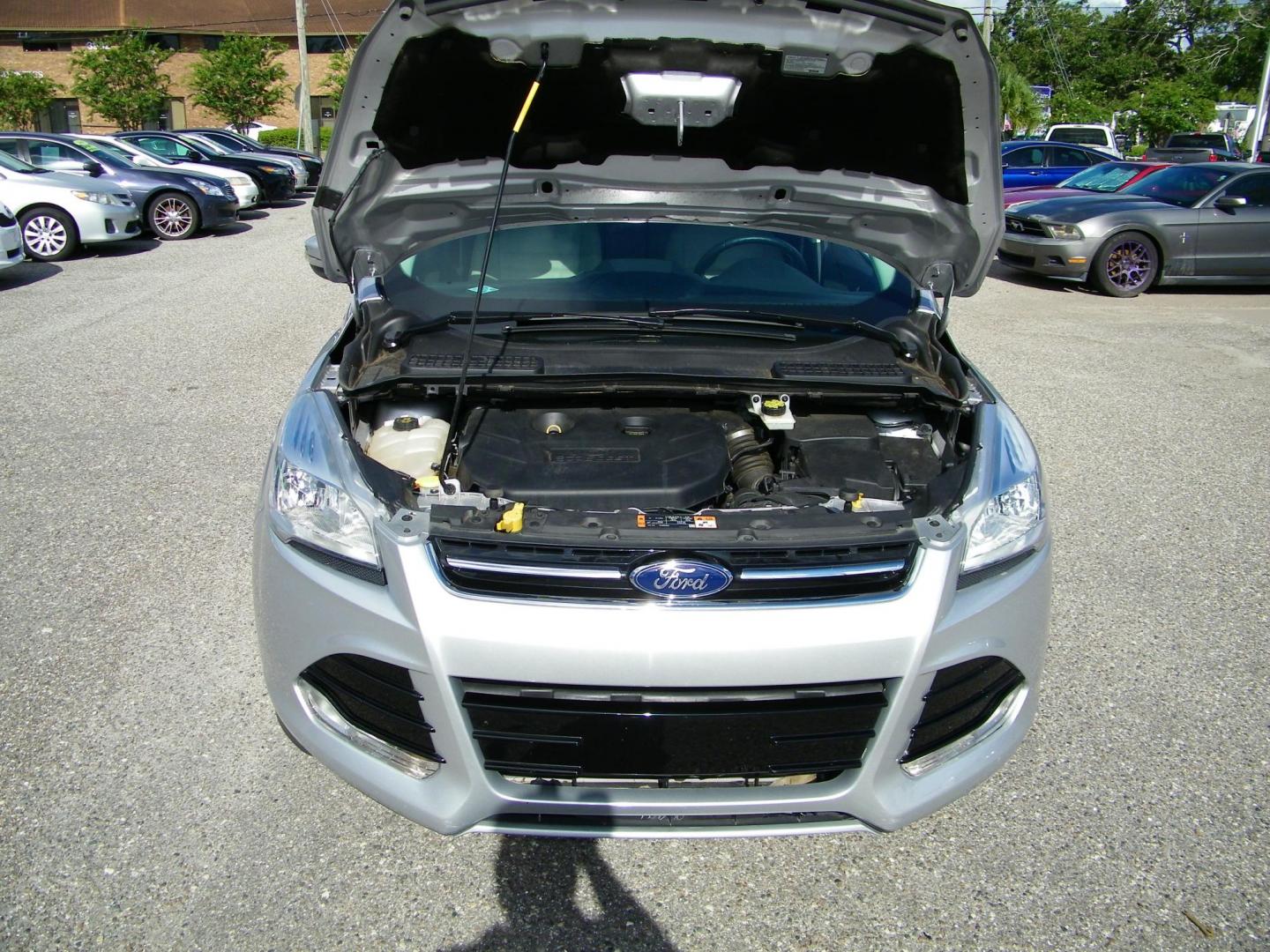 2016 Silver /Beige Ford Escape Titanium FWD (1FMCU0J95GU) with an 2.0L L4 DOHC 16V engine, 6-Speed Automatic transmission, located at 4000 Bee Ridge Road, Sarasota, FL, 34233, (941) 926-0300, 27.298664, -82.489151 - Photo#8