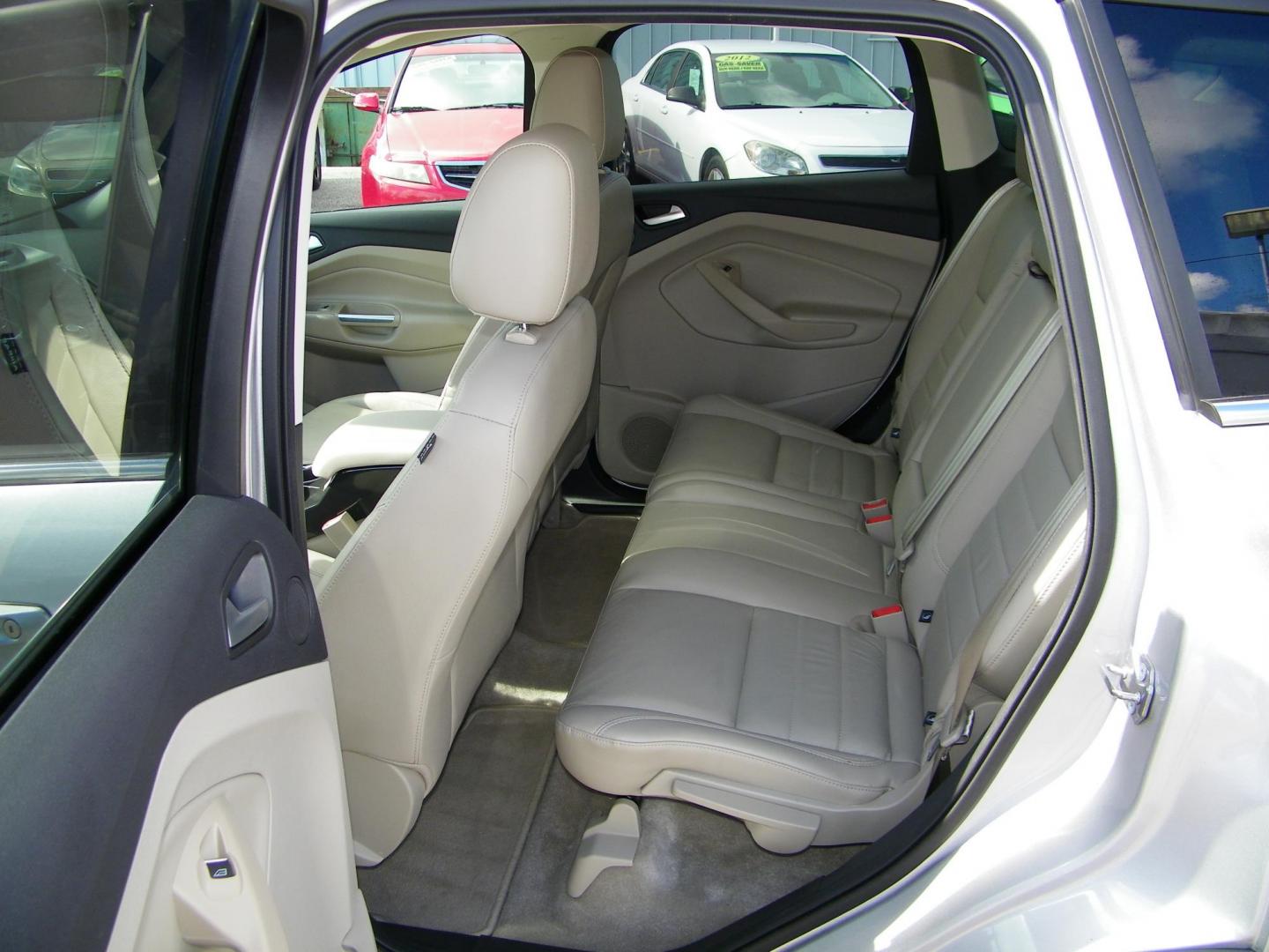 2016 Silver /Beige Ford Escape Titanium FWD (1FMCU0J95GU) with an 2.0L L4 DOHC 16V engine, 6-Speed Automatic transmission, located at 4000 Bee Ridge Road, Sarasota, FL, 34233, (941) 926-0300, 27.298664, -82.489151 - Photo#10