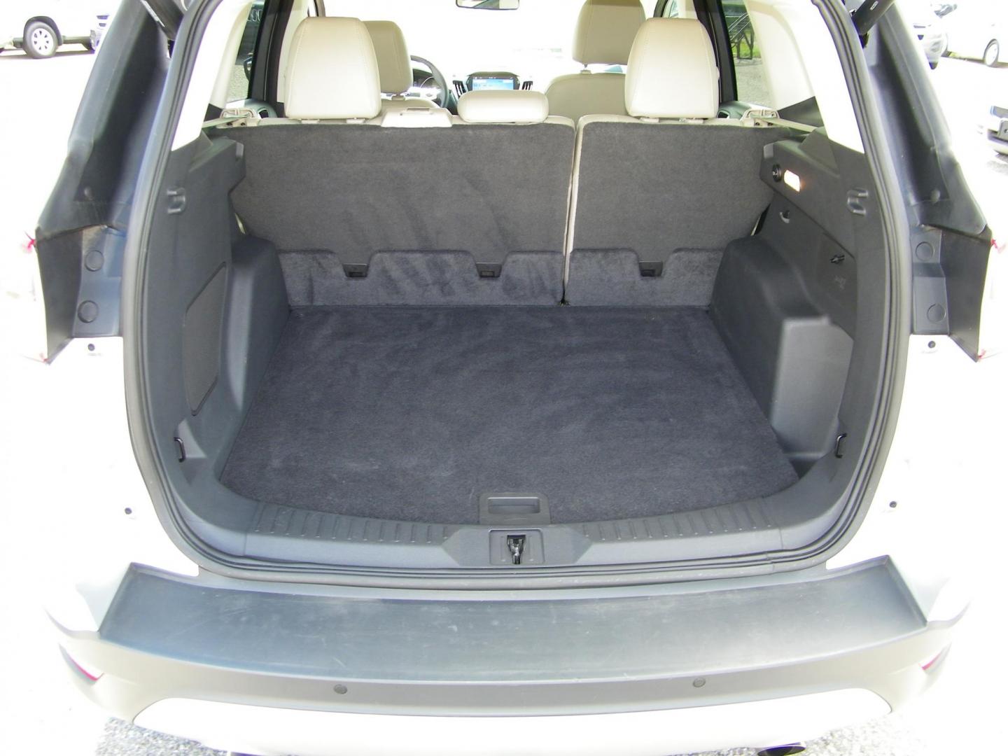 2016 Silver /Beige Ford Escape Titanium FWD (1FMCU0J95GU) with an 2.0L L4 DOHC 16V engine, 6-Speed Automatic transmission, located at 4000 Bee Ridge Road, Sarasota, FL, 34233, (941) 926-0300, 27.298664, -82.489151 - Photo#11