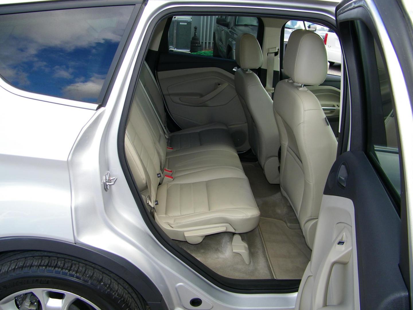 2016 Silver /Beige Ford Escape Titanium FWD (1FMCU0J95GU) with an 2.0L L4 DOHC 16V engine, 6-Speed Automatic transmission, located at 4000 Bee Ridge Road, Sarasota, FL, 34233, (941) 926-0300, 27.298664, -82.489151 - Photo#13