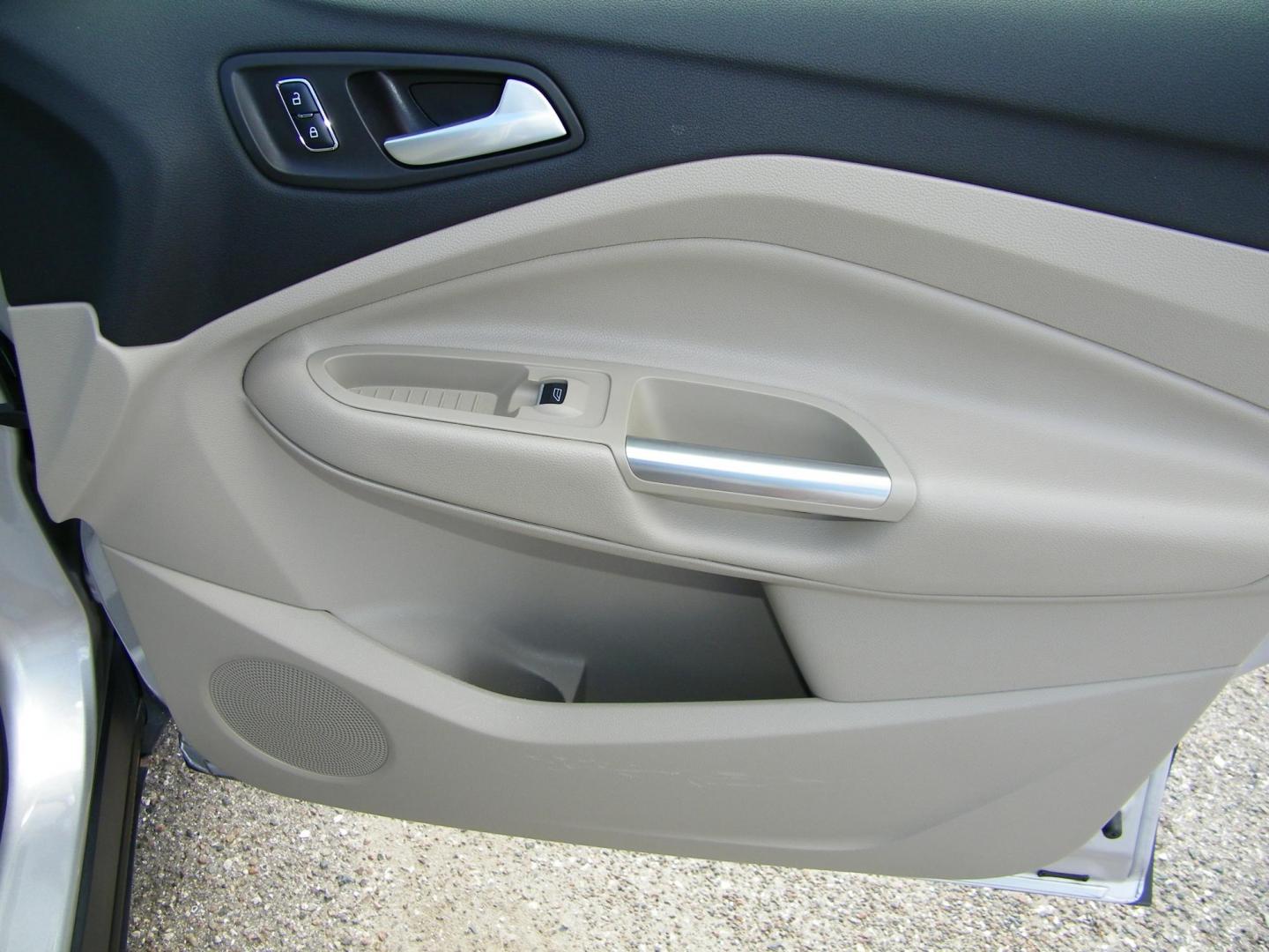 2016 Silver /Beige Ford Escape Titanium FWD (1FMCU0J95GU) with an 2.0L L4 DOHC 16V engine, 6-Speed Automatic transmission, located at 4000 Bee Ridge Road, Sarasota, FL, 34233, (941) 926-0300, 27.298664, -82.489151 - Photo#15