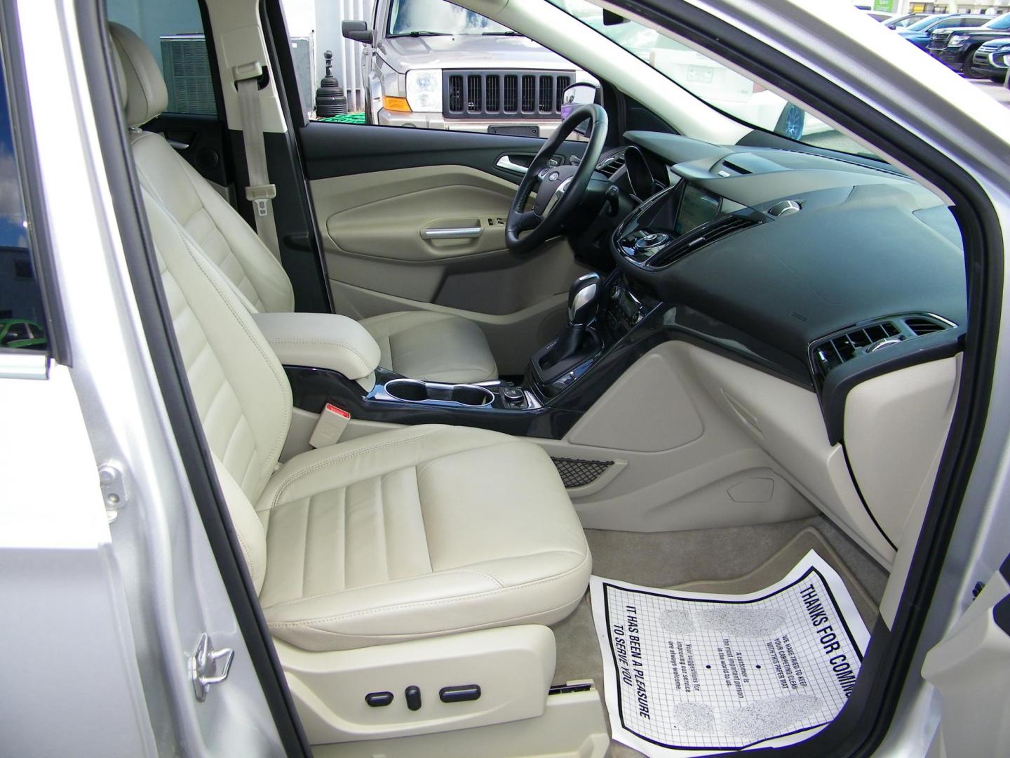 2016 Silver /Beige Ford Escape Titanium FWD (1FMCU0J95GU) with an 2.0L L4 DOHC 16V engine, 6-Speed Automatic transmission, located at 4000 Bee Ridge Road, Sarasota, FL, 34233, (941) 926-0300, 27.298664, -82.489151 - Photo#17